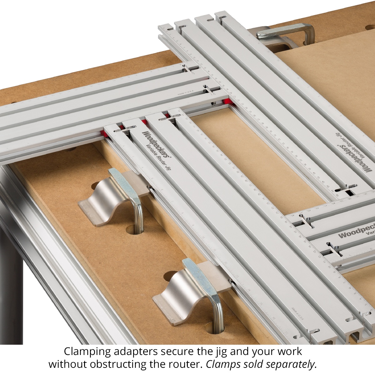 Woodpeckers Variable Router Jig clamping adapters securing the jig on a workbench while leaving clear access for the router