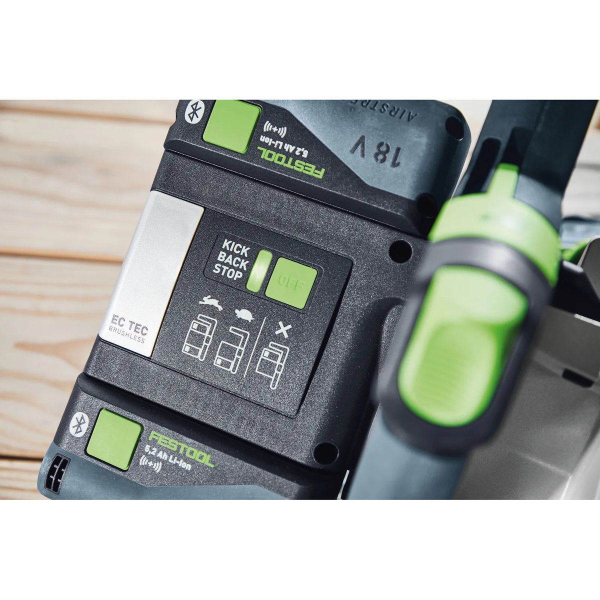 Festool 577677 TSC 55 K Cordless Track Saw 5.0Ah Kit with Kickback Stop close-up of the kickback stop control and dual battery interface on the saw body