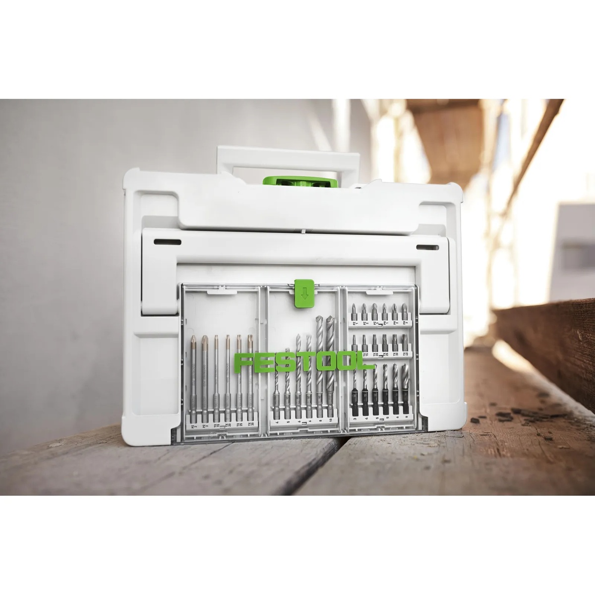 Festool 577779 18-Piece Drill and Driver Bit Cassette BKS SYS3 D3-8 K CE/W F stored on a jobsite bench with labeled wood drill bit sizes for finish carpentry and installation work