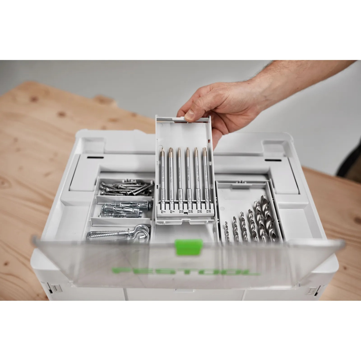 Festool 577782 6-Piece Driver Bit Cassette BKS SYS3 100mm CE F placed in a Systainer lid compartment above screws and drill bits during cabinet and installation work