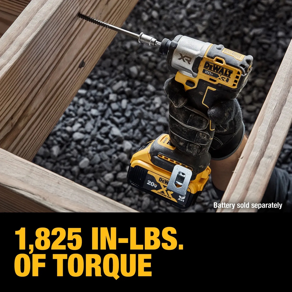 DEWALT DCF845B 20V MAX XR 1/4 in. Impact Driver driving a long screw into framing lumber in a tight construction opening