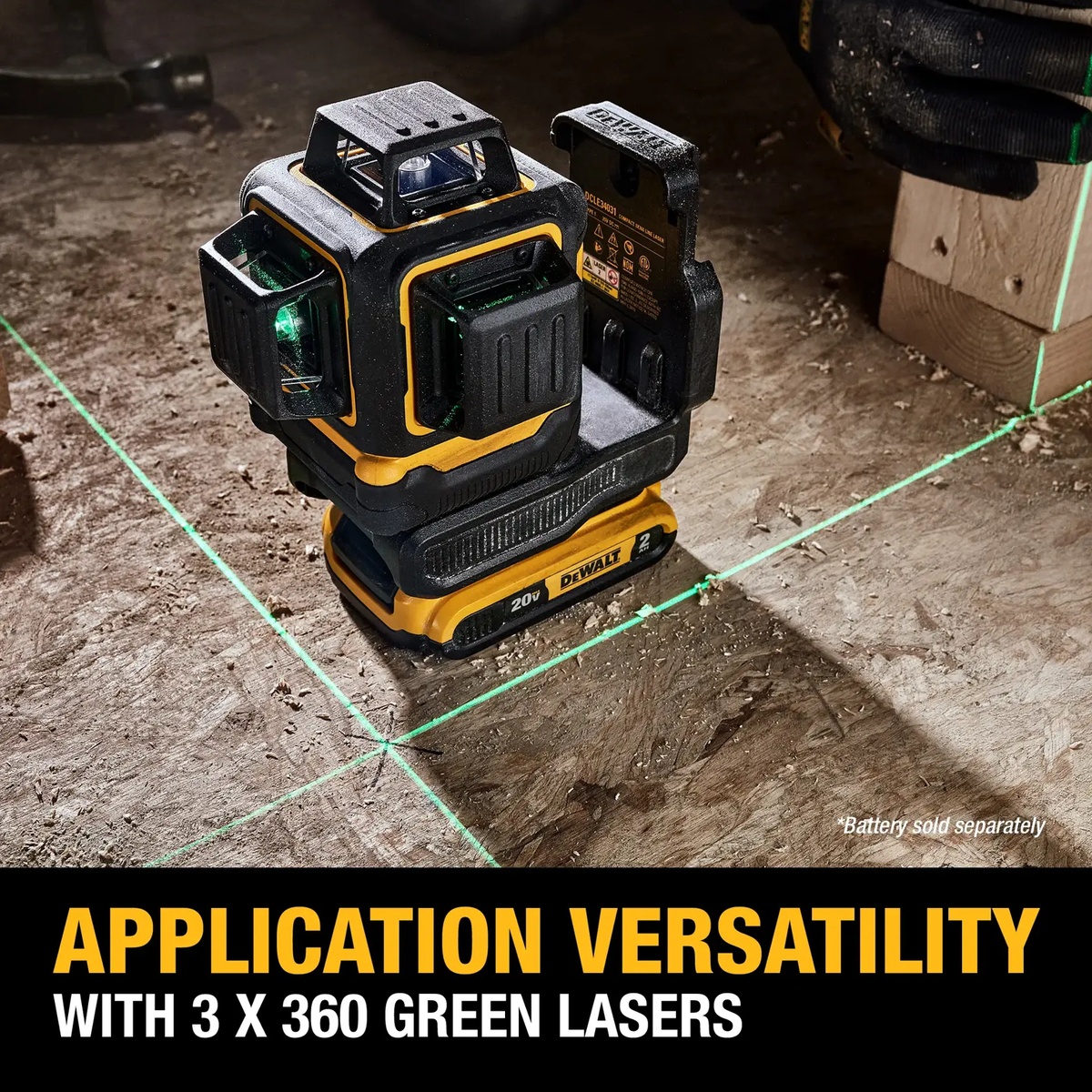 DEWALT 20V 3 x 360 Line Laser projecting green layout lines across a jobsite floor for interior framing and alignment work