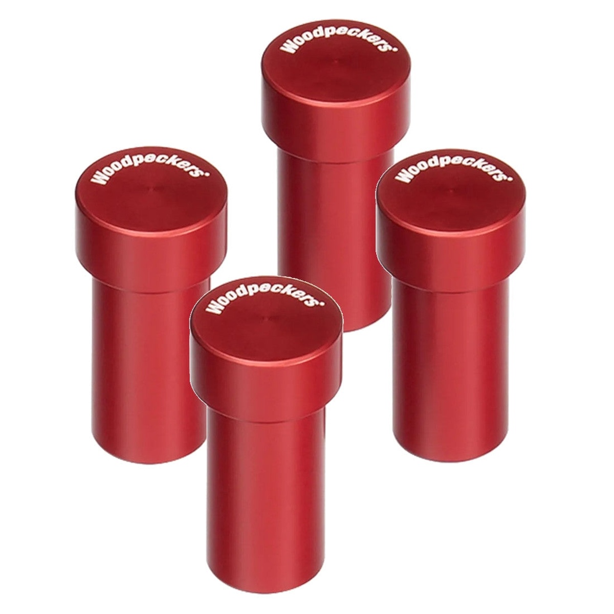 Woodpeckers MFT Positioning Dogs 4-Pack shown as four red positioning dogs for MFT bench layout and repeatable woodworking setup on a shop work surface