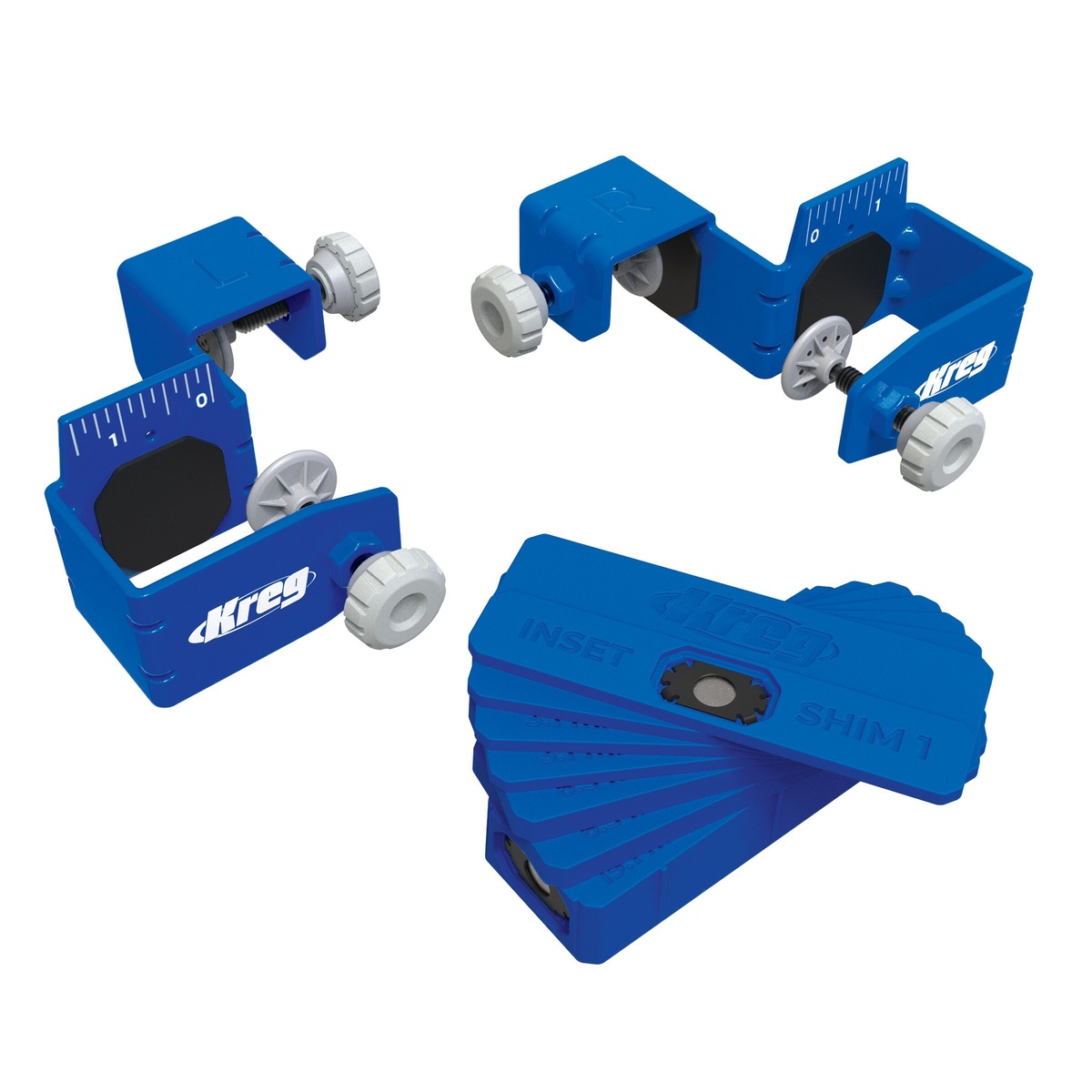 Kreg Drawer Front Mounting System KCS-DFMT-PRO with left and right mounting clamps and magnetic setup shims arranged for cabinet drawer front installation on a workbench