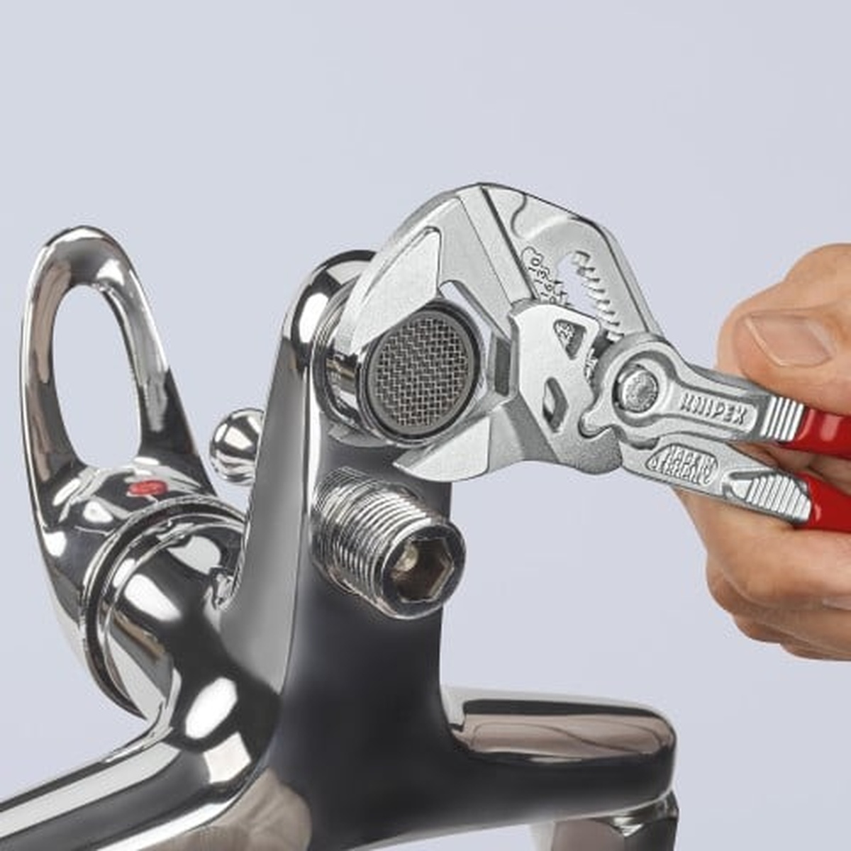 Knipex 00 20 06 US2 3 Pc Pliers Wrench Set turning a plumbing fitting by hand in close working quarters
