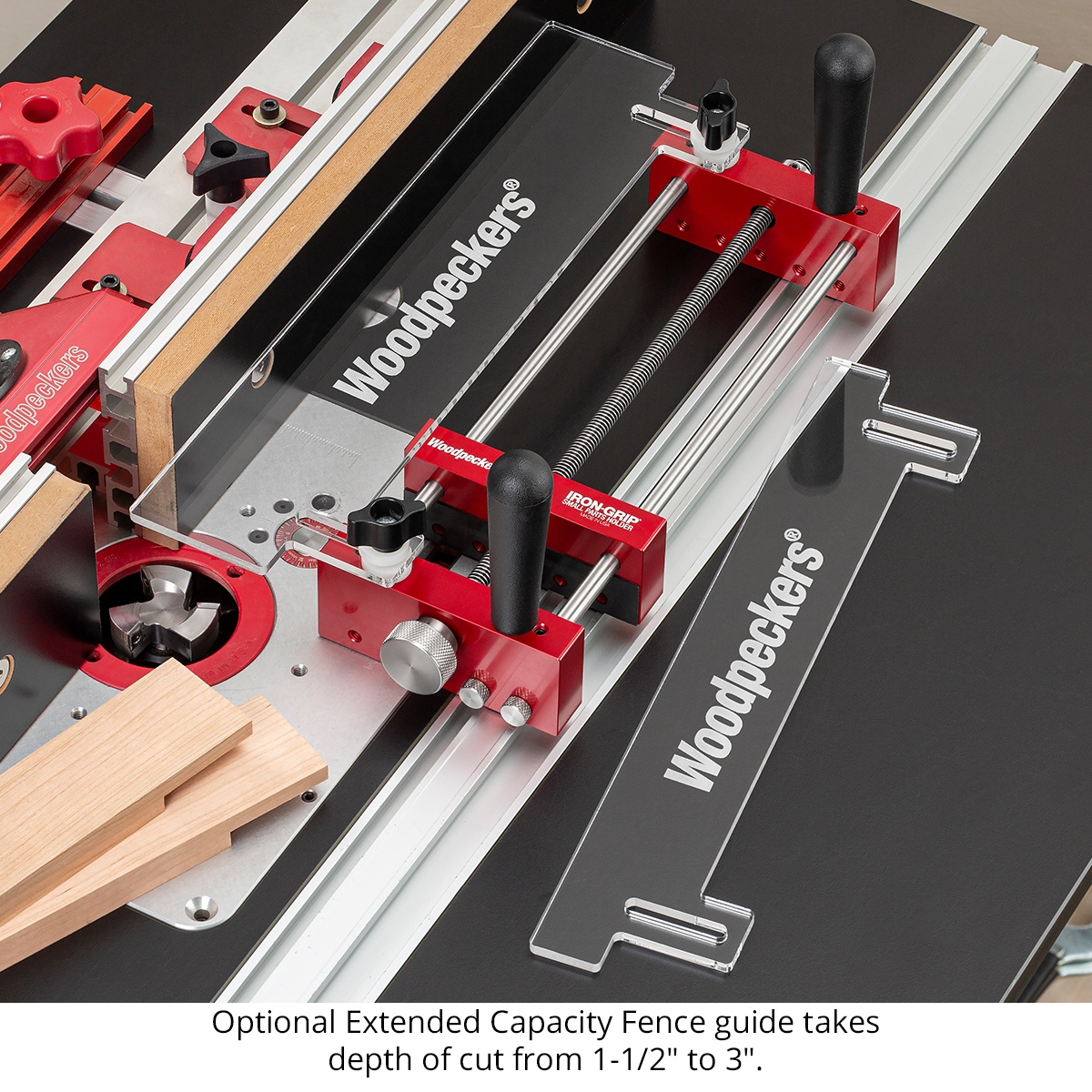 Woodpeckers Iron-Grip Small Parts Holder with optional extended capacity fence guide on a router table for deeper woodworking cuts