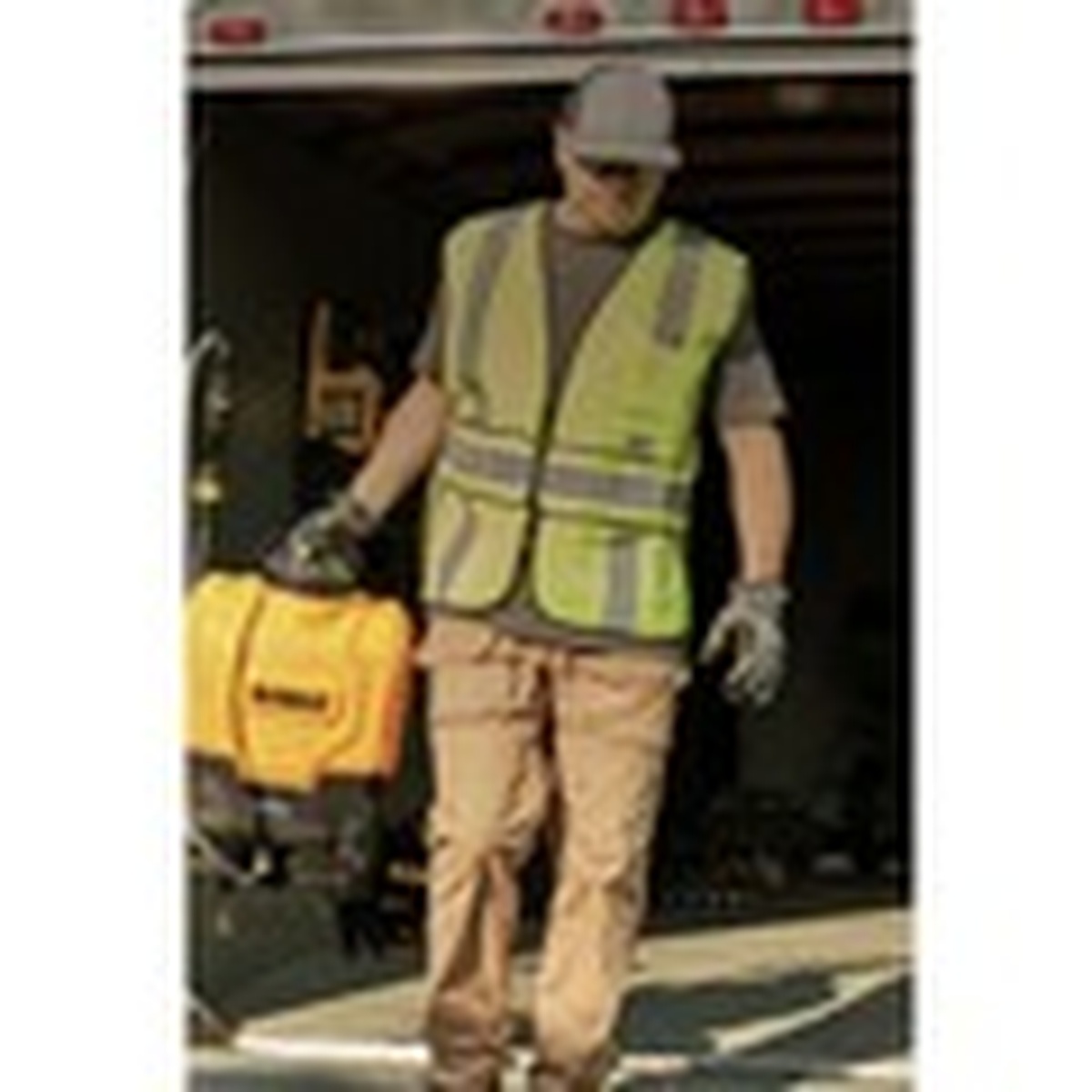 DeWalt DXSP190681B 20V MAX 4-Gallon Backpack Sprayer being carried from a truck for jobsite spraying and property maintenance
