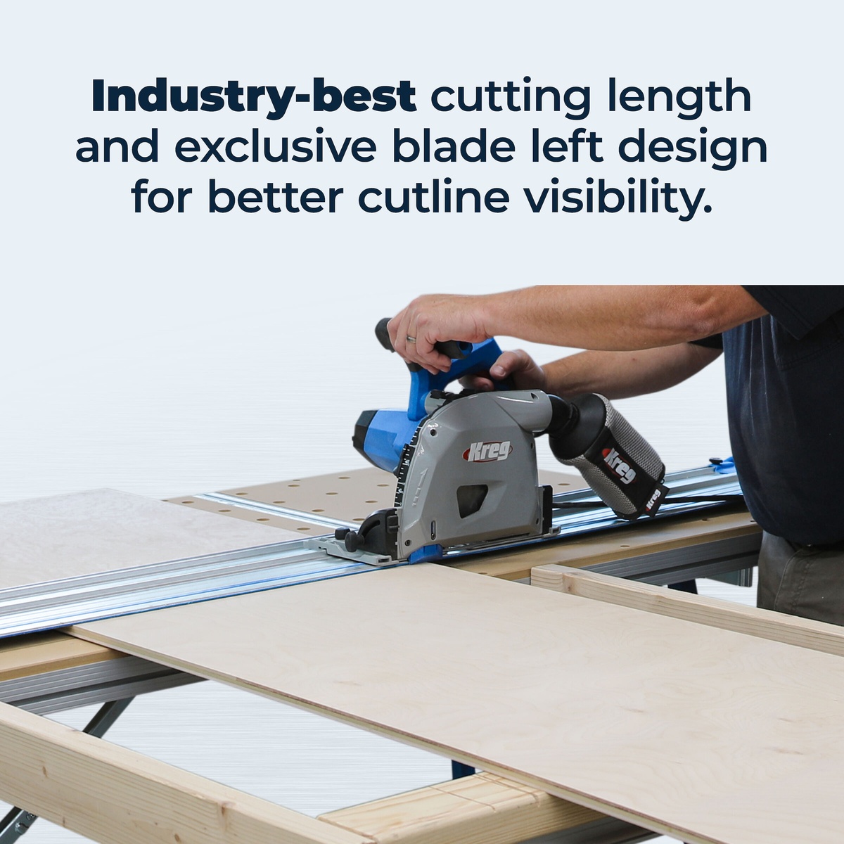 Kreg ACS2100 plunge saw with guide track cutting a plywood sheet on a work support table in a workshop setting