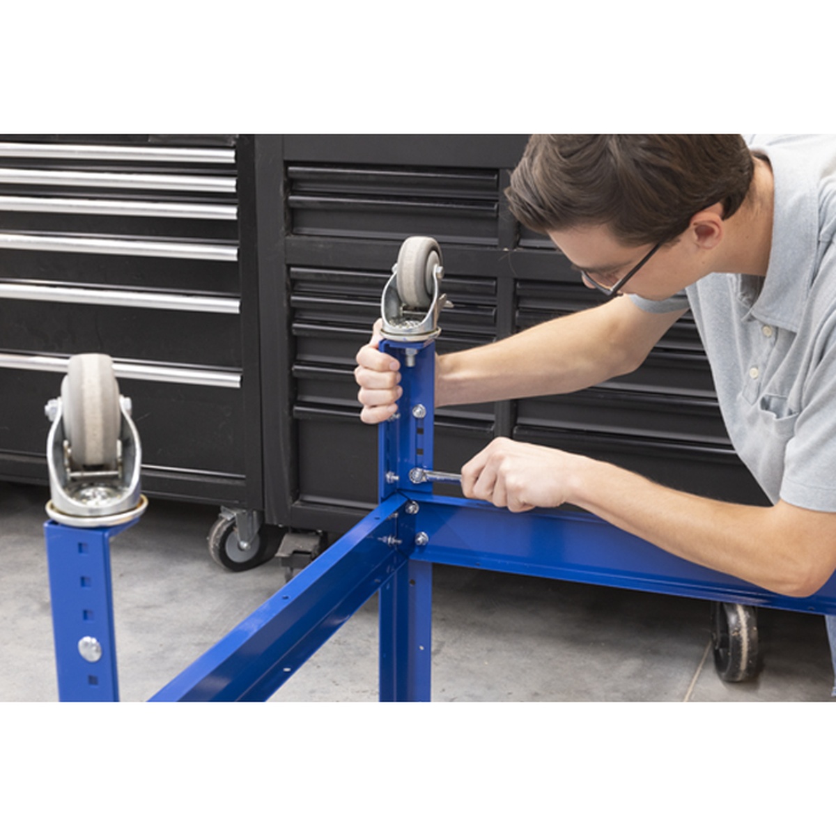Kreg Tool UBENCH-6824-DH workbench frame being assembled with caster posts for a movable workshop bench setup