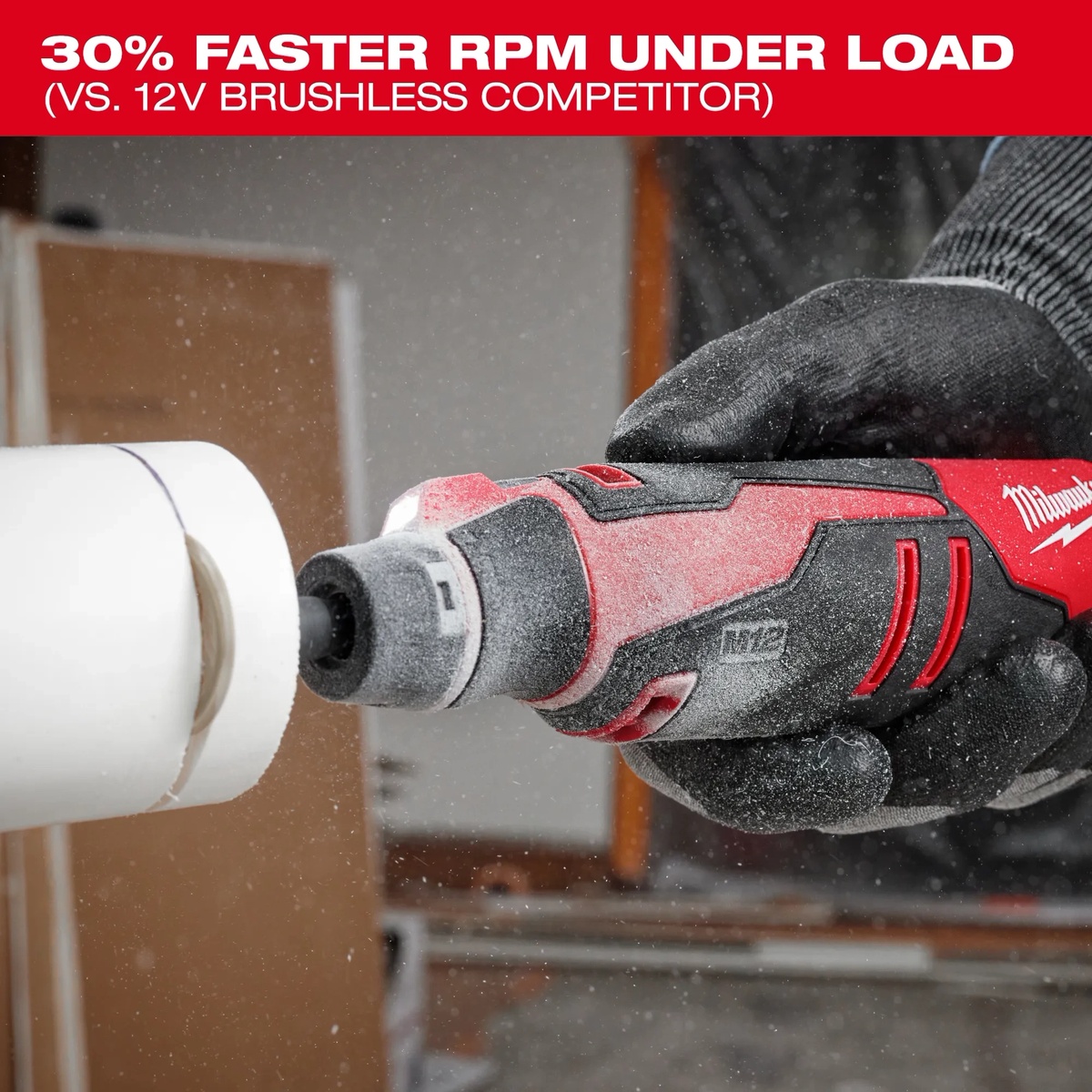 Milwaukee 2525-20 M12 Brushless Rotary Tool sanding a PVC pipe in a work area while maintaining speed under load
