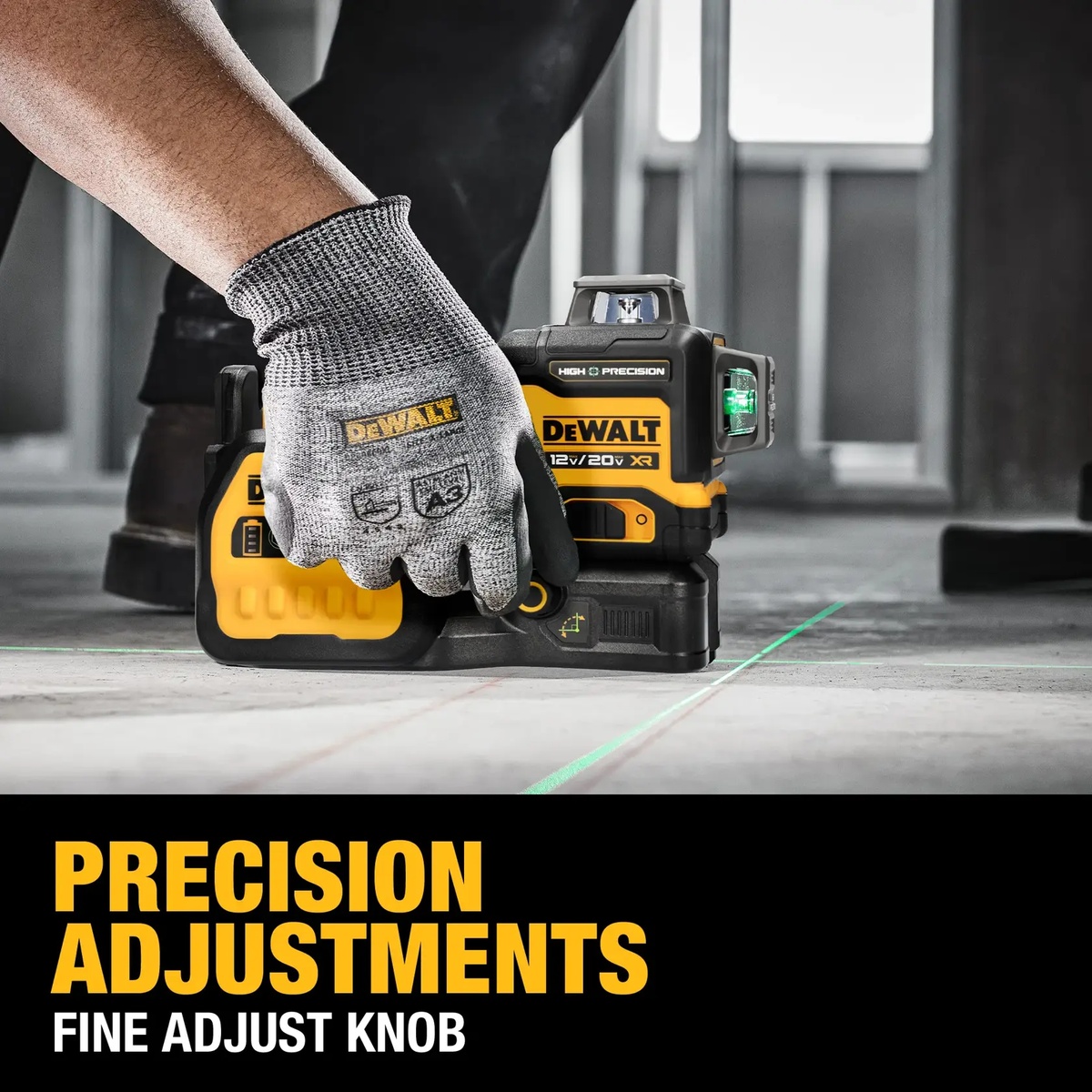 DEWALT DCLE34033D1 20V MAX XR 3 x 360 High Precision Green Laser fine adjust knob being used for precise plumb line setup on an indoor construction site