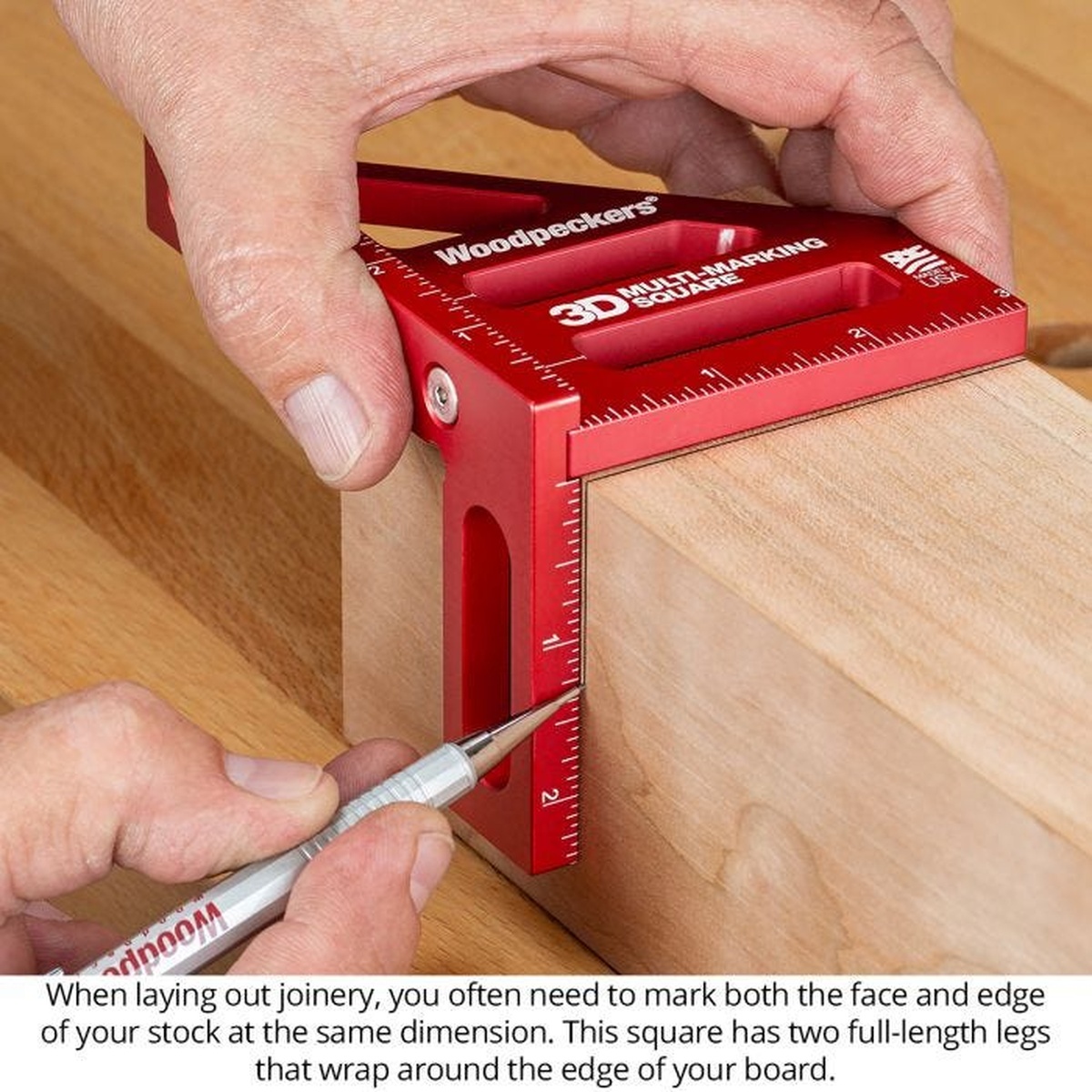 Woodpeckers 3D Multi-Marking Square Metric marking the face and edge of a wood board during joinery layout on a workbench