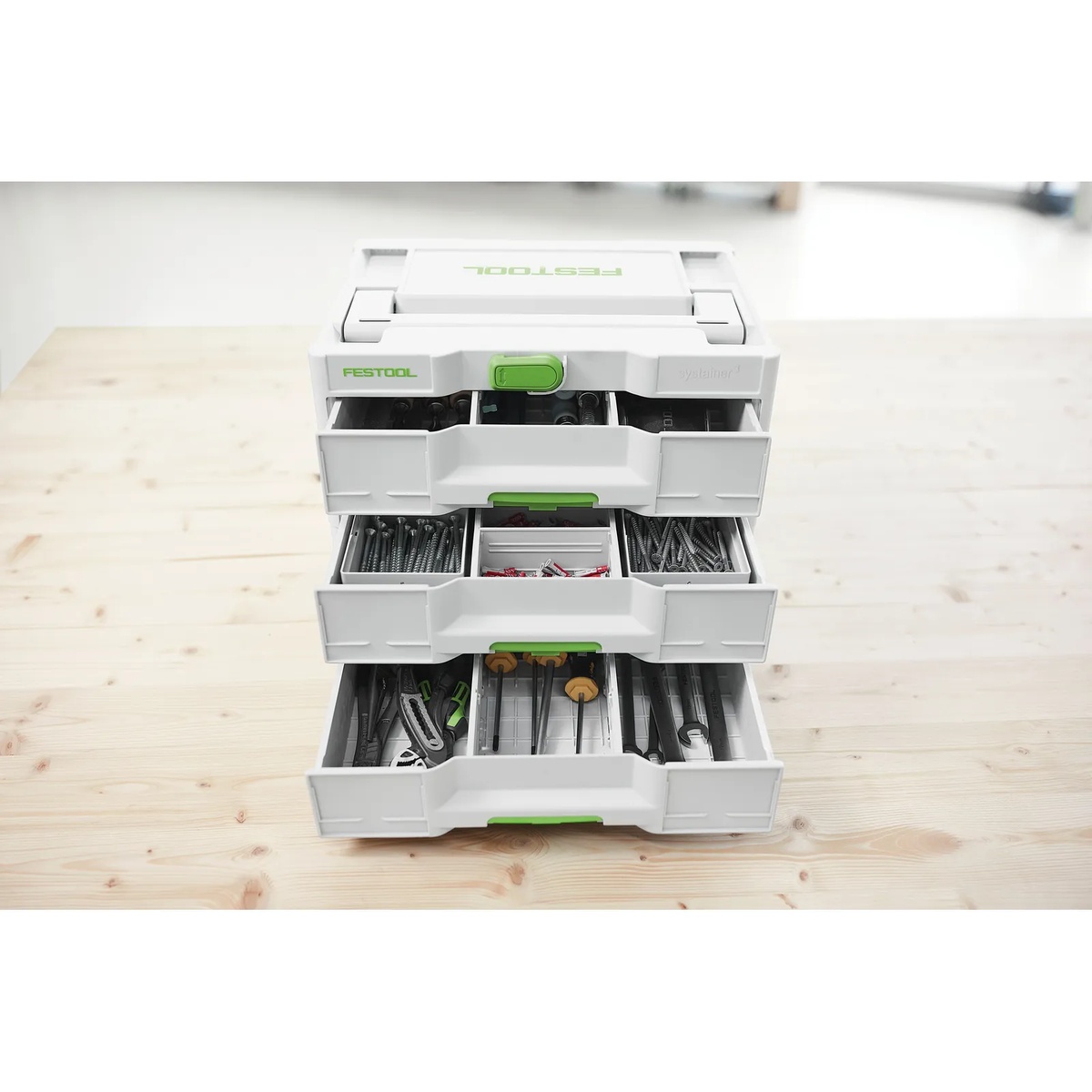 Festool 577769 SYS3-SORT/3 M 337 Systainer opened on a workbench with screws, small hardware, and hand tools organized in the drawers for shop and jobsite storage