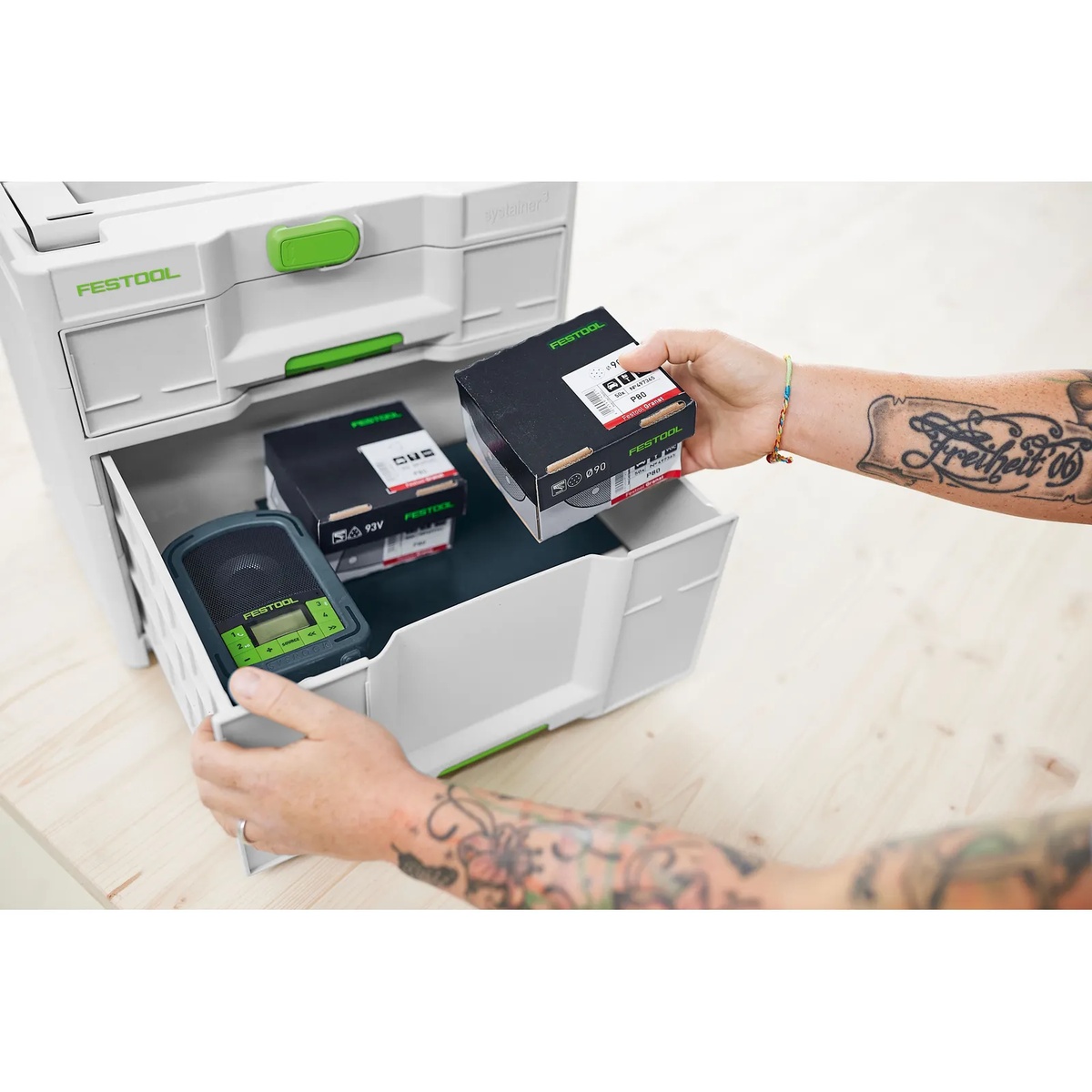 Festool 577770 SYS3-SORT/2 M 337 Systainer upper drawer holding boxed accessories and small electronic gear on a workshop bench