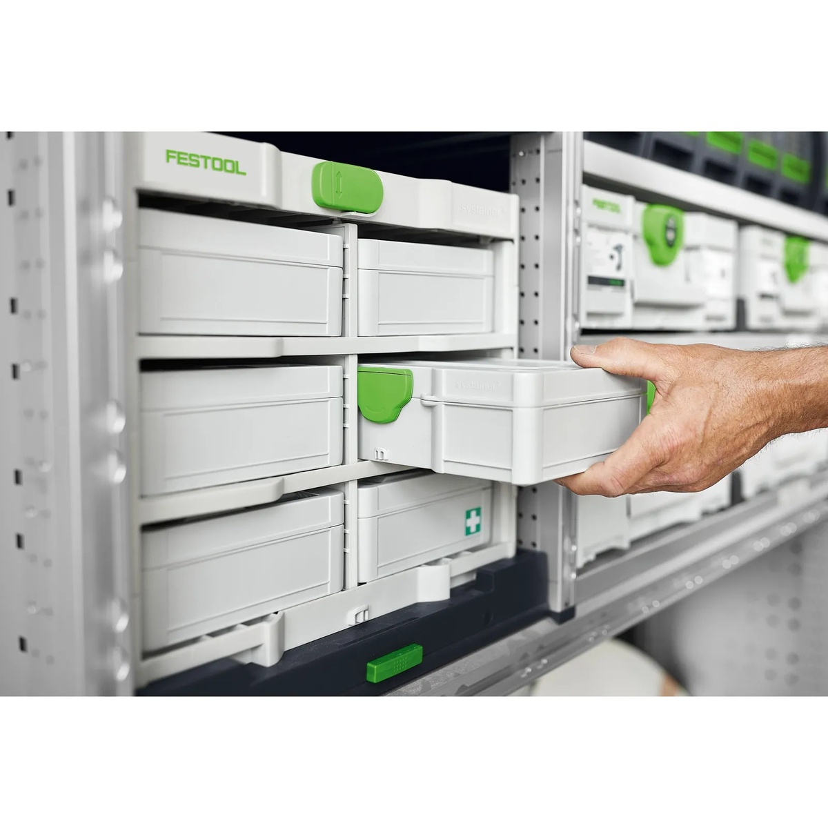 Festool 577808 SYS3 S 76 Mini Systainer being pulled from a vehicle storage rack for mobile jobsite organization