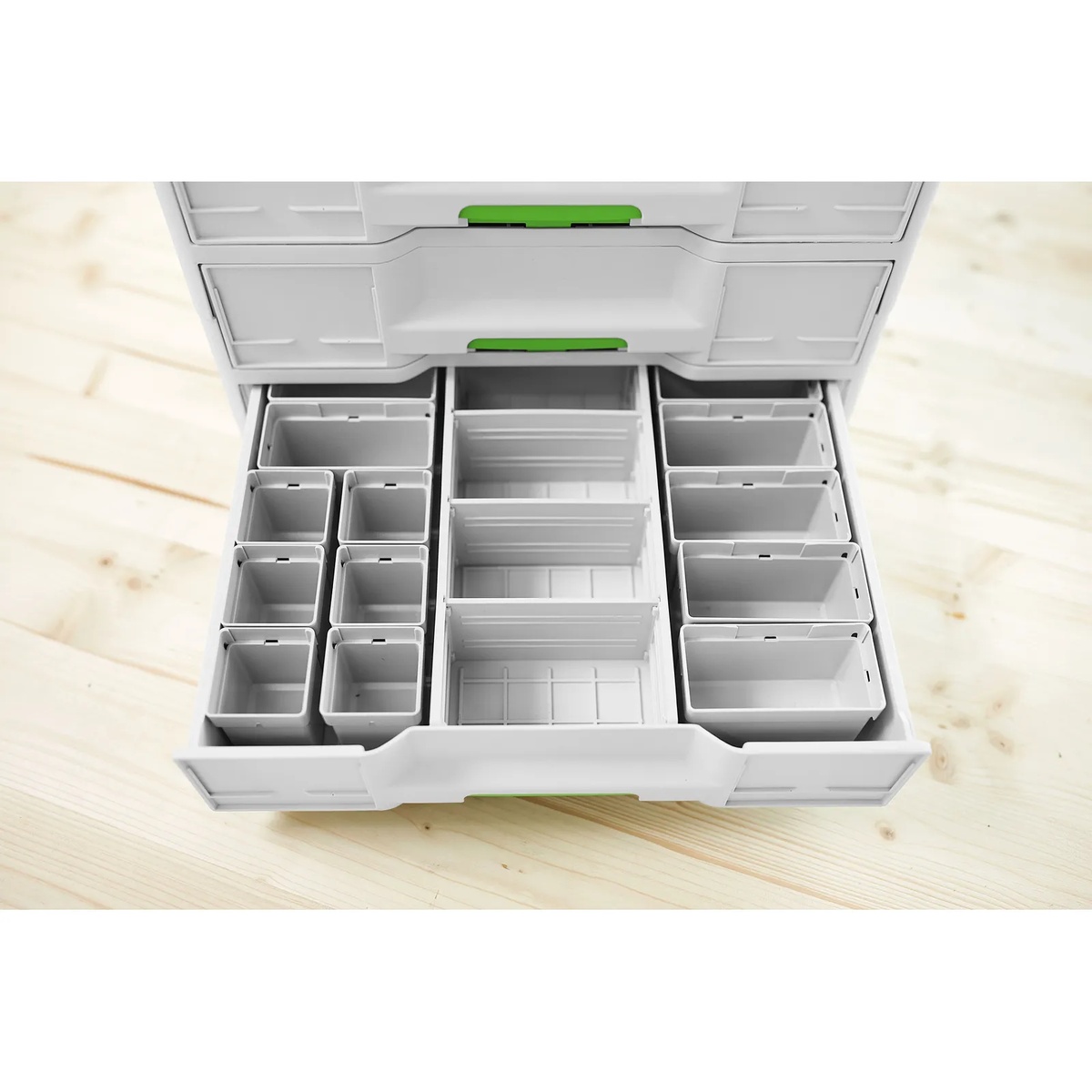 Festool 578056 50x50/50x100x68-Set 13-Piece Systainer Insert Set fitted inside a Sortainer3 drawer on a workbench showing the bin layout for organized small-part storage
