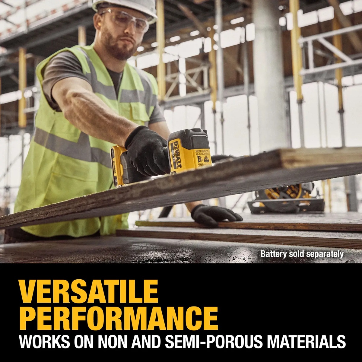 DEWALT DCE592B 20V MAX GRABO Lifter moving a large sheet material on a construction jobsite for material handling and installation work