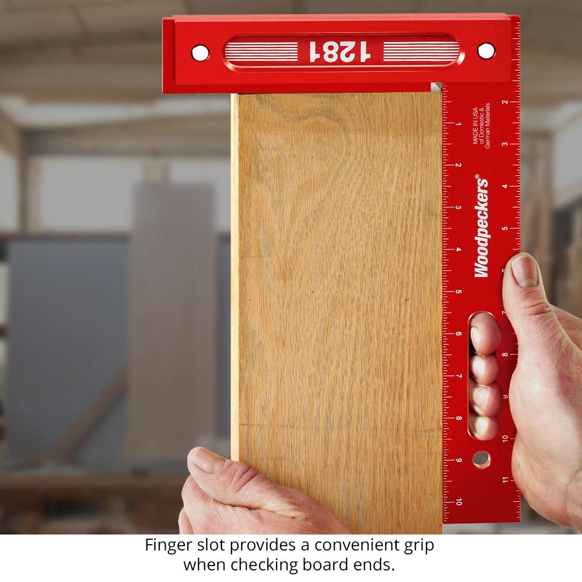 Woodpeckers 1281 Precision Woodworking Square checking the end of a wood board in a woodworking shop, showing the finger slot grip for controlled squareness checks