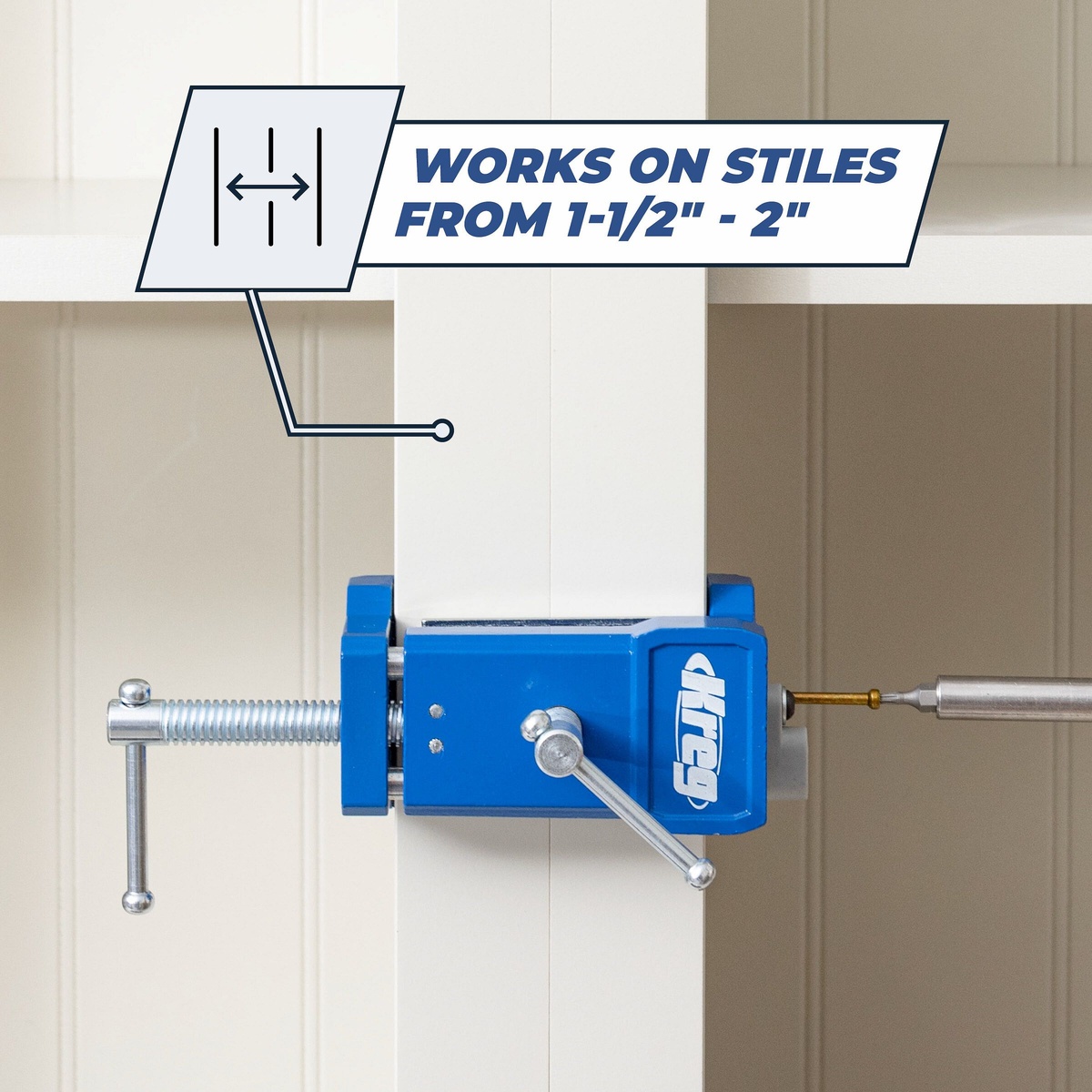 Kreg KCS-FFC2 face frame clamp installed on a cabinet stile during fastening on a painted cabinet frame