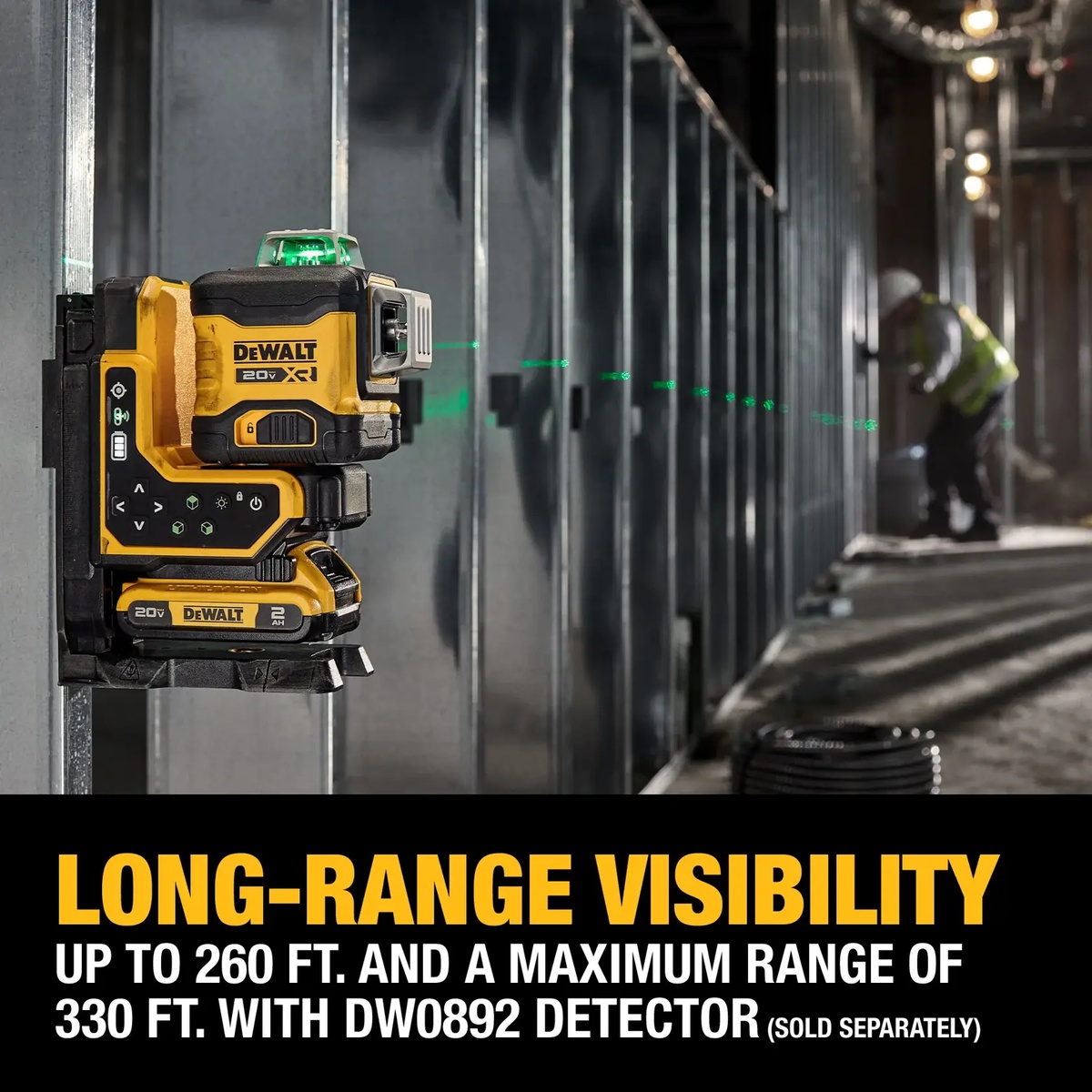 DeWALT DCLE34035D1 20V MAX 3x360 Remote Control Laser Kit mounted on steel framing projecting a green beam across an interior construction area