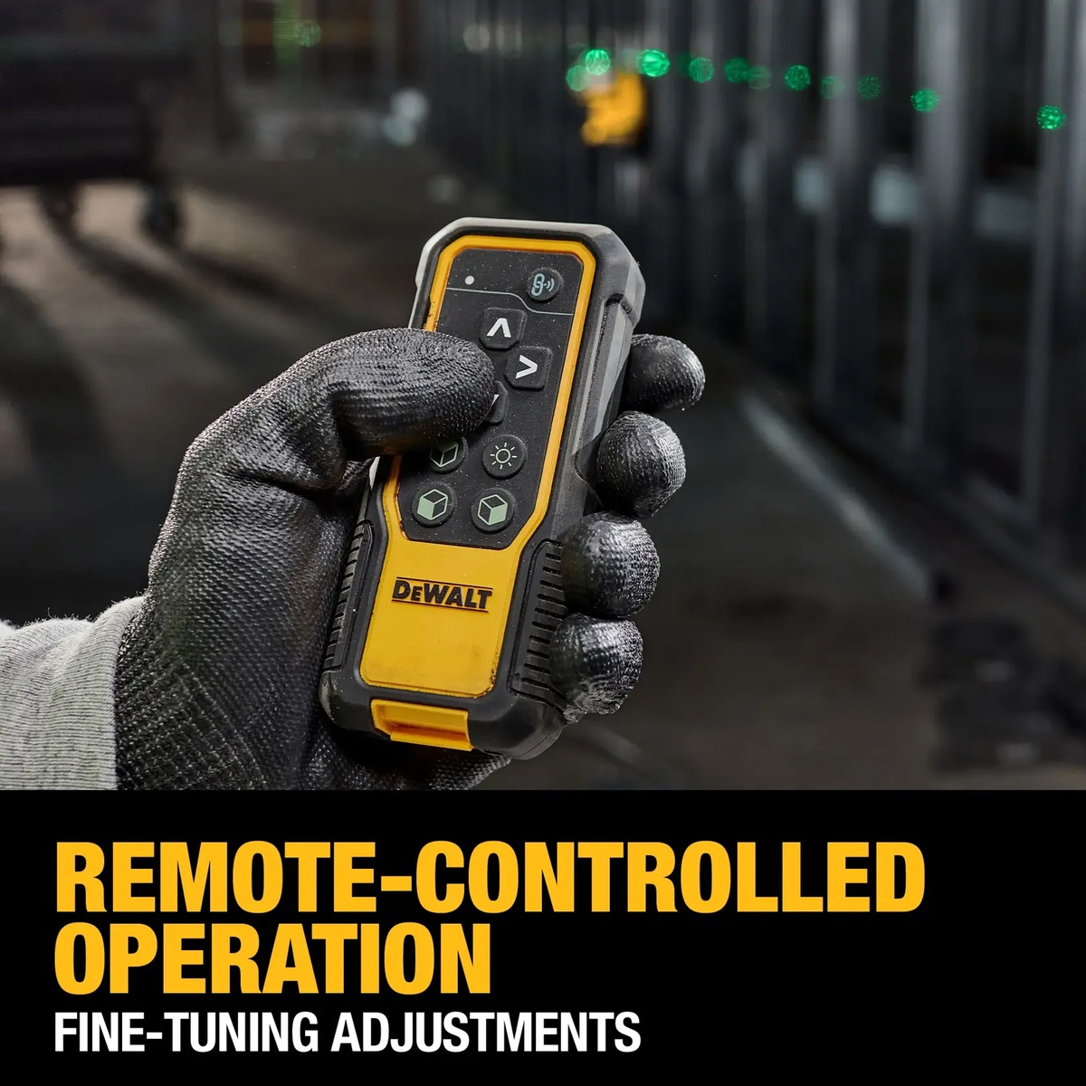 DeWALT DCLE34035D1 20V MAX 3x360 Remote Control Laser Kit remote control being used for line laser adjustment inside a framed interior jobsite