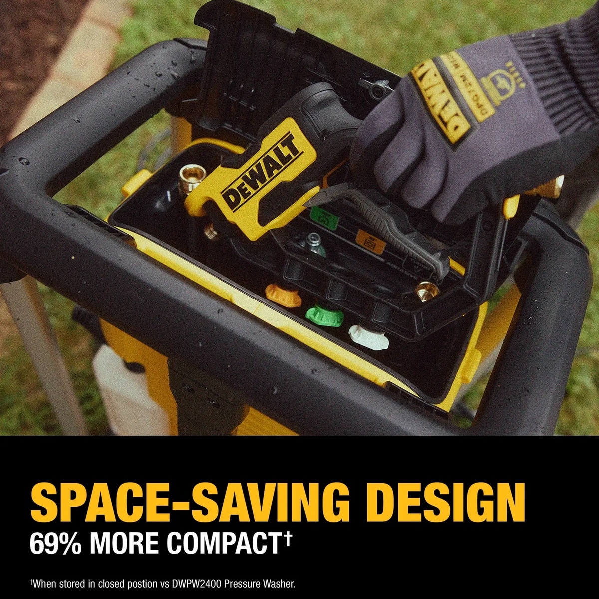 DeWALT DWPW2600 Electric Jobsite Pressure Washer onboard storage holding the spray gun and nozzles during outdoor cleanup setup