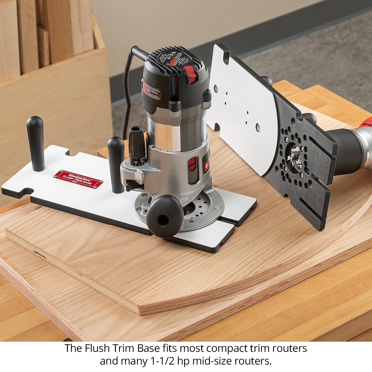Woodpeckers Flush Trim Base mounted to a router for trimming edge banding on a curved wood panel at a woodworking bench