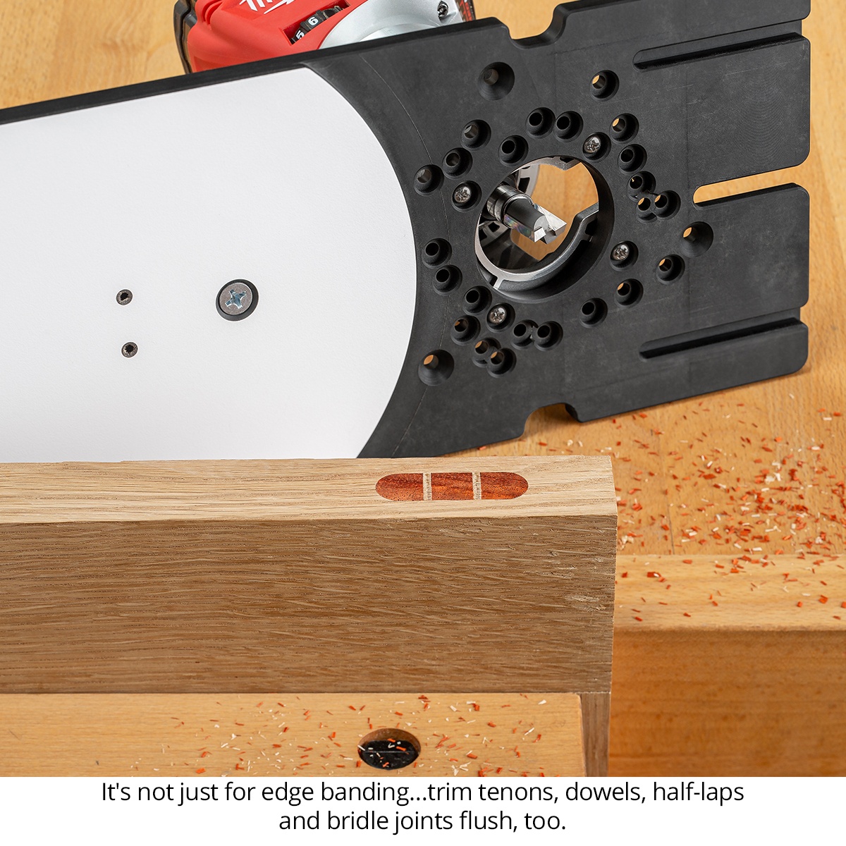 Woodpeckers Flush Trim Base trimming wood joinery flush on a bench with tenon and dowel work in a woodworking shop