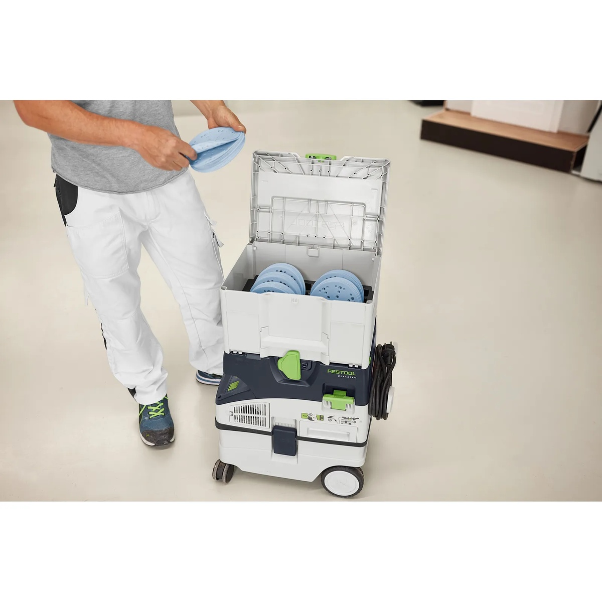 Festool 578192 Granat D150 Abrasives 120-Piece Value Set Systainer3 stacked on a Festool dust extractor cart for jobsite transport and organized sanding supply storage