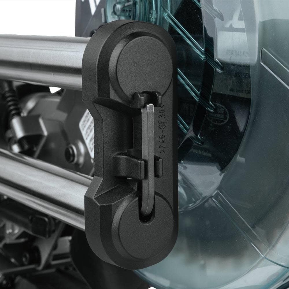 Makita 40V Max XGT Brushless Cordless 8-1/2 Inch Dual-Bevel Sliding Compound Miter Saw close-up of the rail-forward slide system designed to save space near a wall in a shop or remodel room