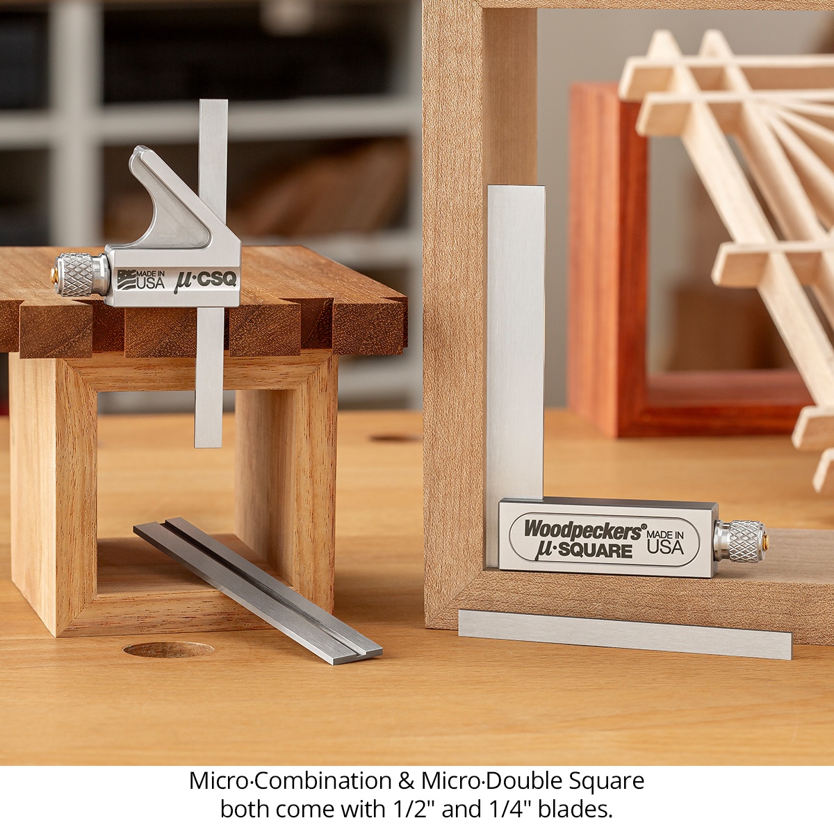 Woodpeckers Micro-Combination & Micro-Double Square Combo showing both square styles with 1/2 inch and 1/4 inch blades on a woodworking bench