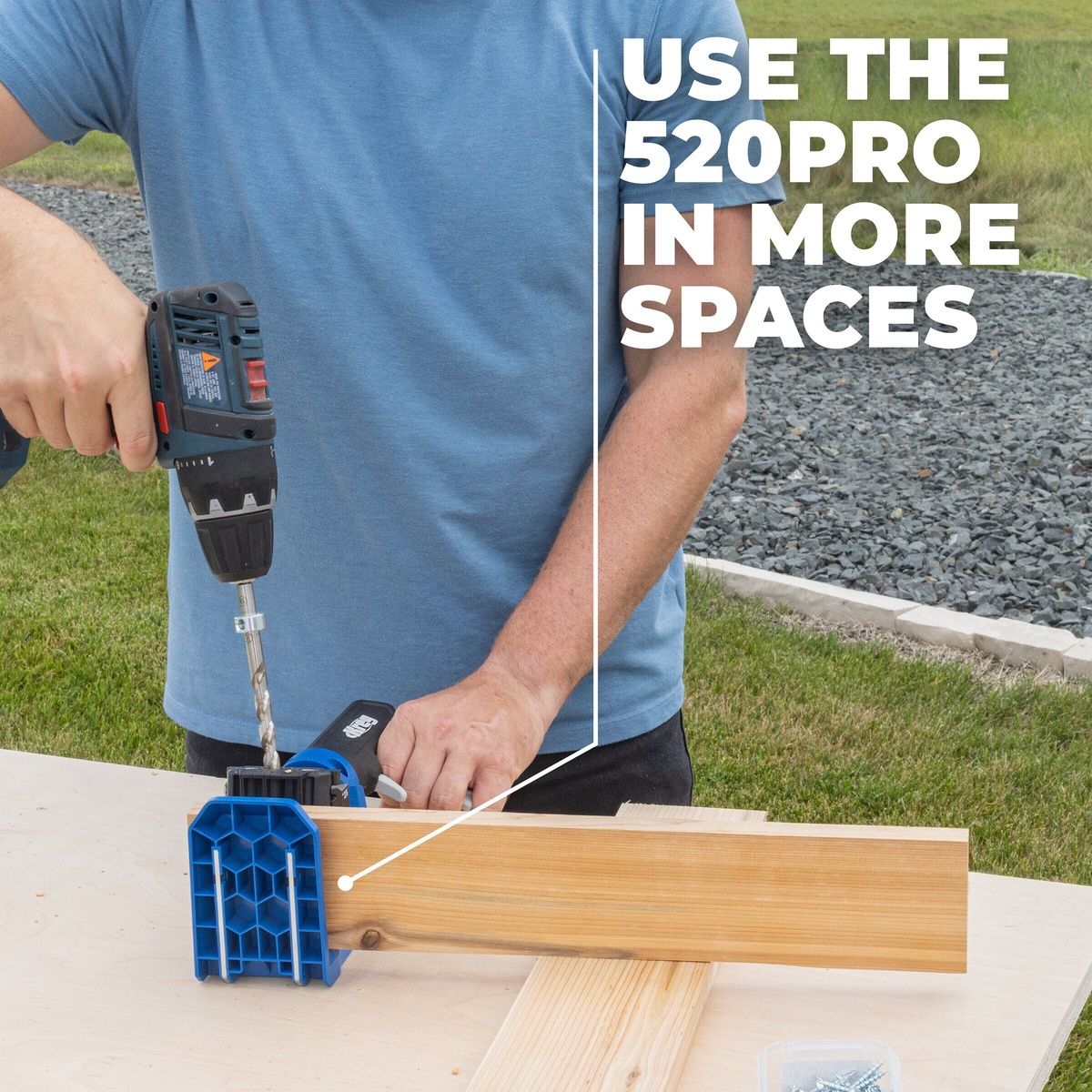 Kreg Tool Pocket-Hole Jig 520PRO drilling a pocket hole into a wood board during an outdoor woodworking setup with a handheld drill