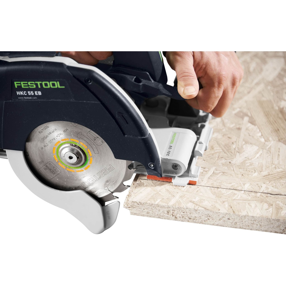 Festool 576173 HKC 55 Cordless Bluetooth 5.2Ah Track Saw PLUS-FSK close-up showing blade area and plunge cutting on oriented strand board