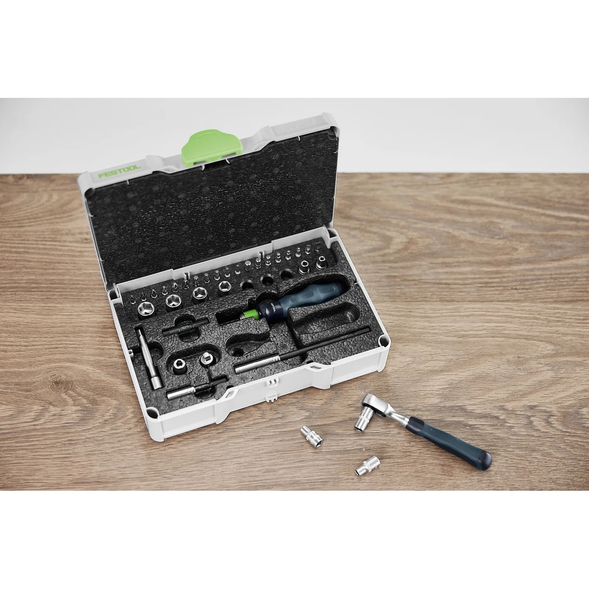 Festool 578112 Metric Ratchet and Socket Set SYS3 S 76-1/4-CE RA opened on a bench with ratchet, sockets, and driver bits laid out for installation and fastening work