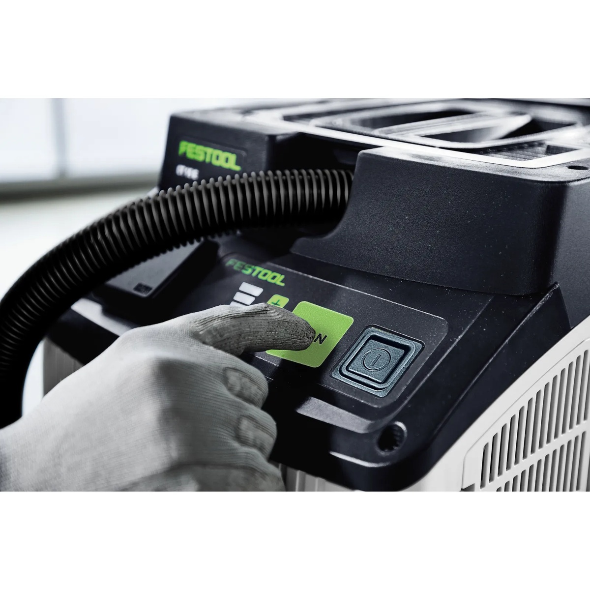 Festool 578441 CLEANTEC CT 15 E HEPA Dust Extractor control panel close-up showing touch controls during shop or jobsite operation