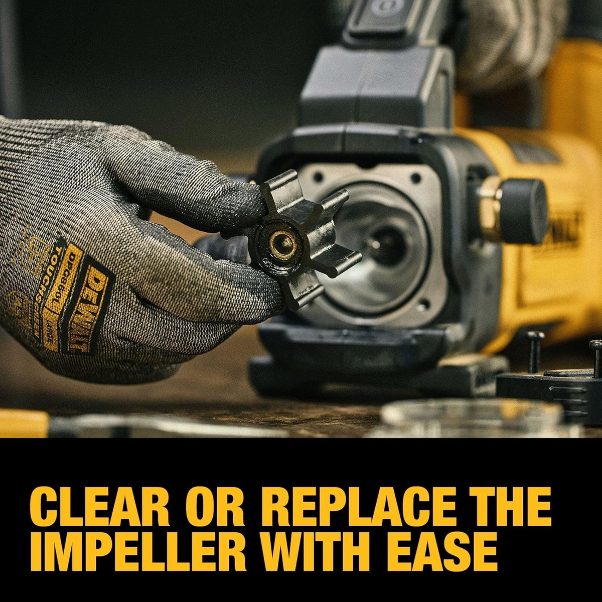 DEWALT DCE050B 20V MAX transfer pump with impeller removed for cleaning or replacement on a workbench
