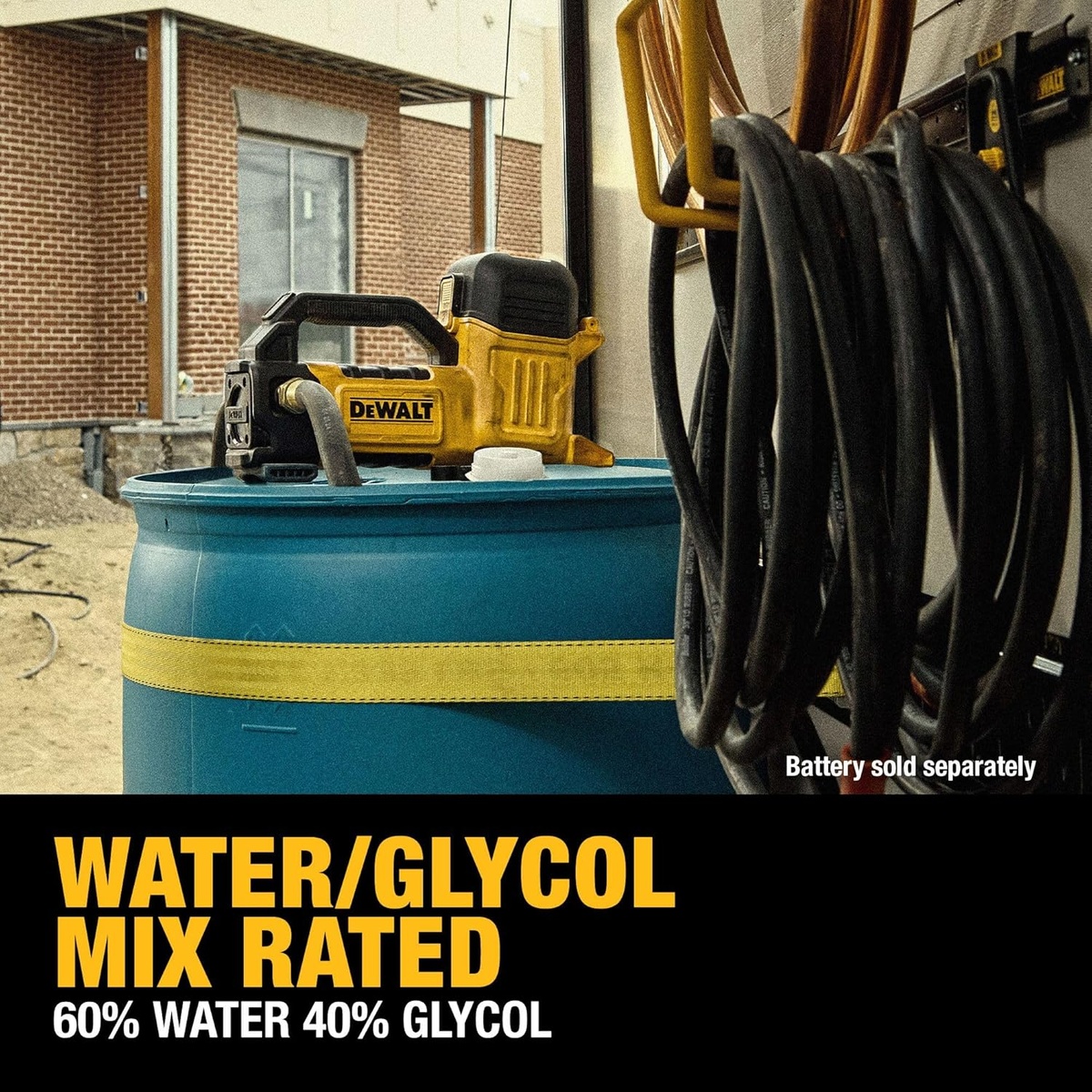 DEWALT DCE050B 20V MAX transfer pump set up on a drum for transferring a water and glycol mixture at a jobsite