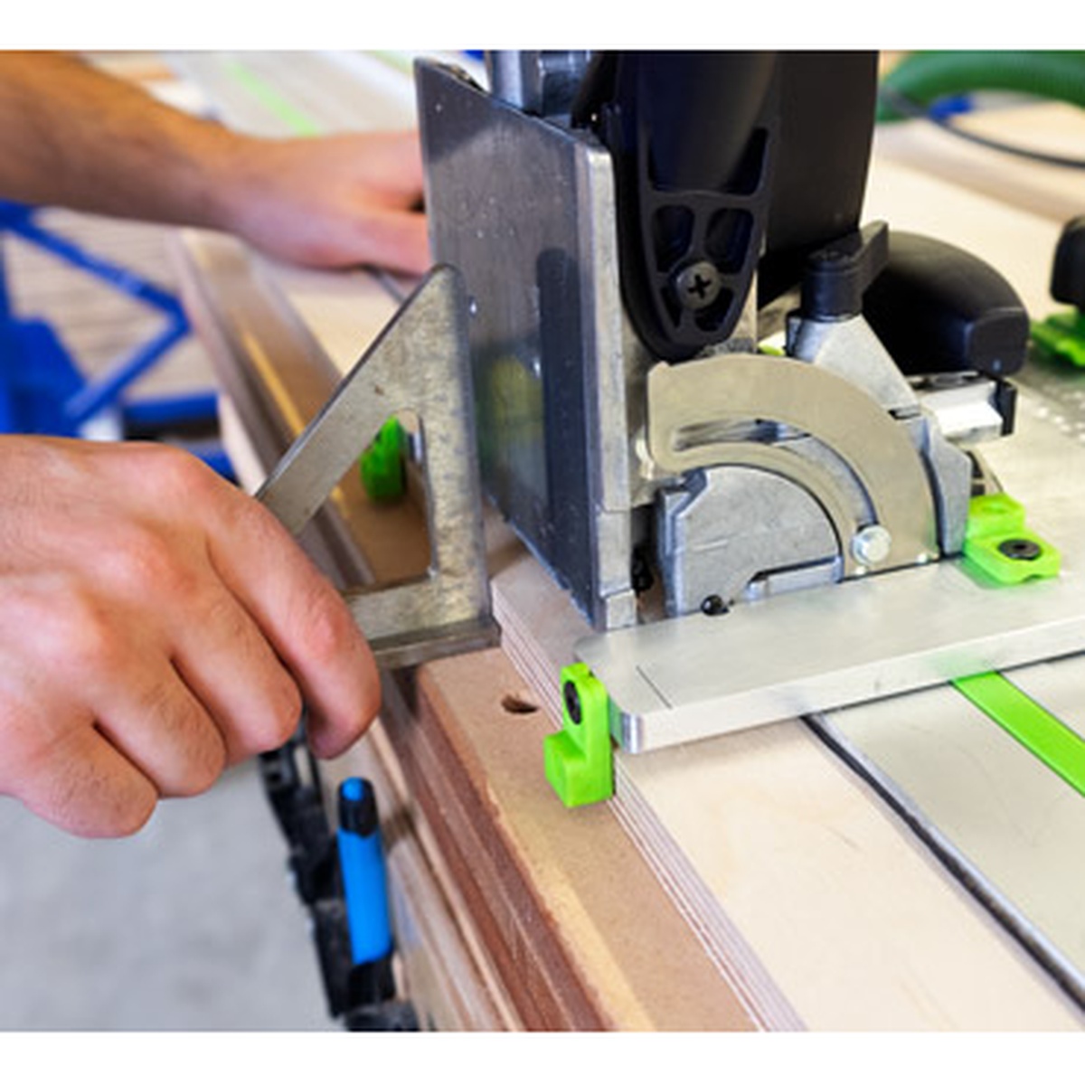 Fastcap Domino Sled for Festool DOMINO cutting a mortise on sheet material with a square for precise alignment in a woodworking shop