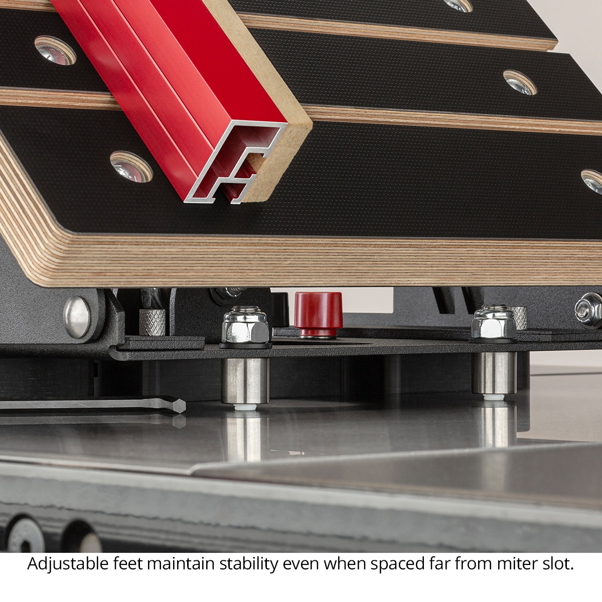 Woodpeckers Joinery Sled adjustable feet supporting the sled on a saw table for stable angled joinery work