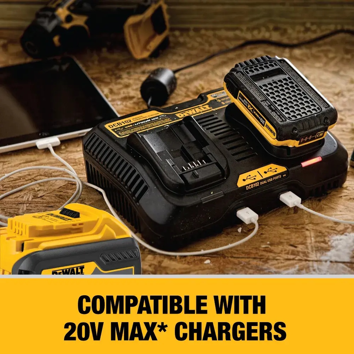 DEWALT DCB609 FLEXVOLT 9Ah Battery shown with a DEWALT charger on a workbench, highlighting charger compatibility for cordless tool users on the jobsite