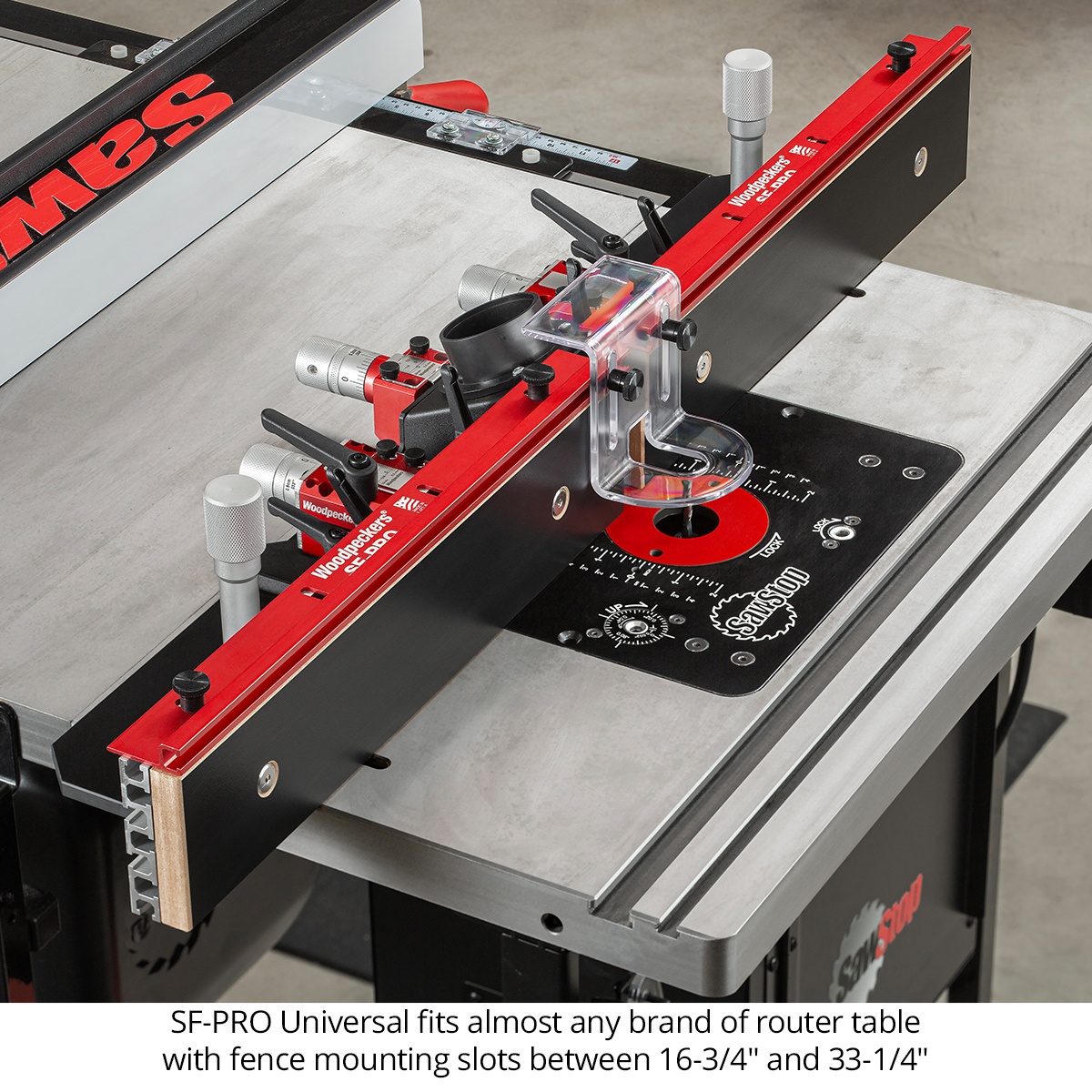 Woodpeckers SF-PRO Universal Router Table Fence installed on a router table in a workshop, showing universal fence mounting and clear guard setup