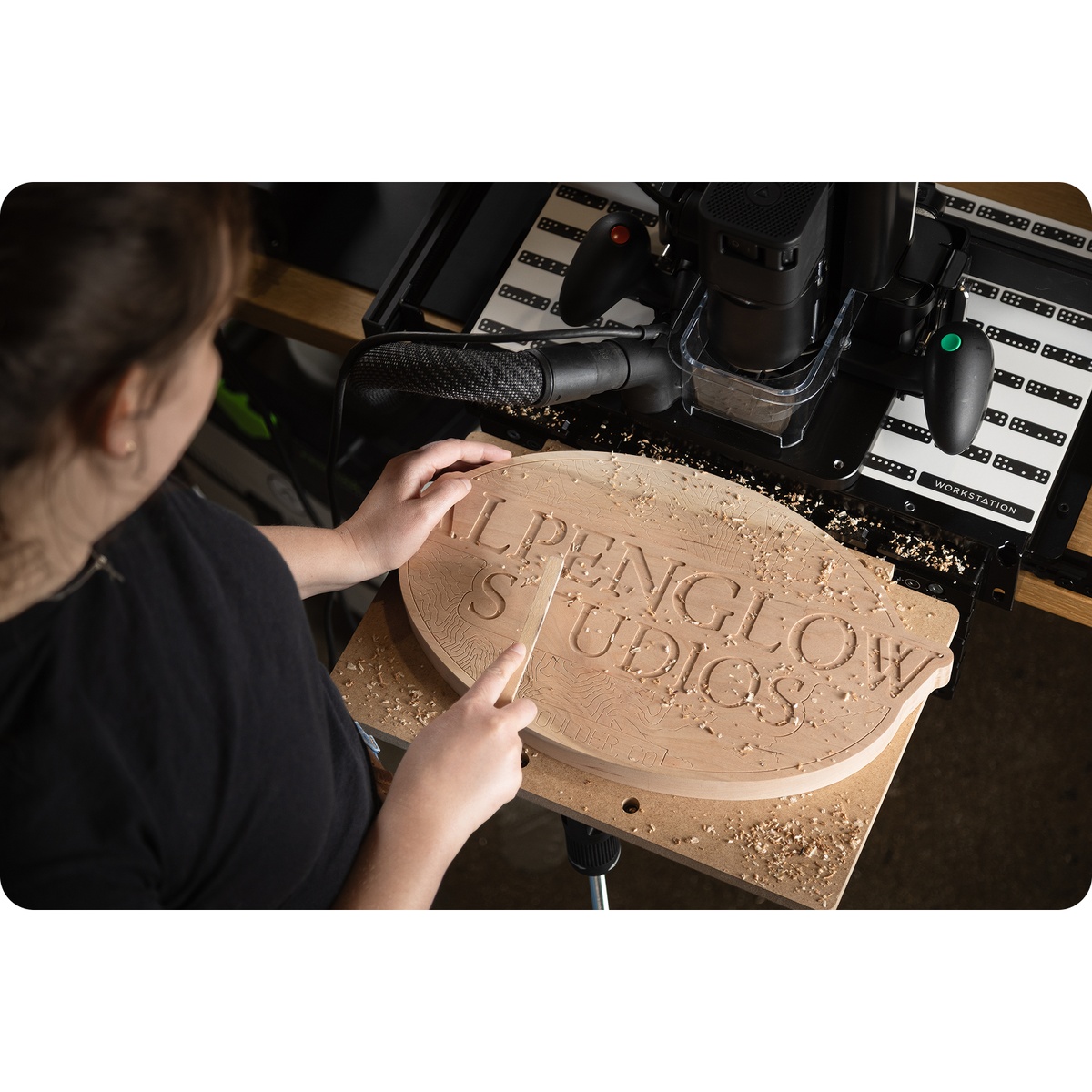 Shaper SU1-WSUK1 Origin Workstation Shelf Upgrade Kit supporting a large wood sign during routing on a Shaper Workstation in a real woodworking setup
