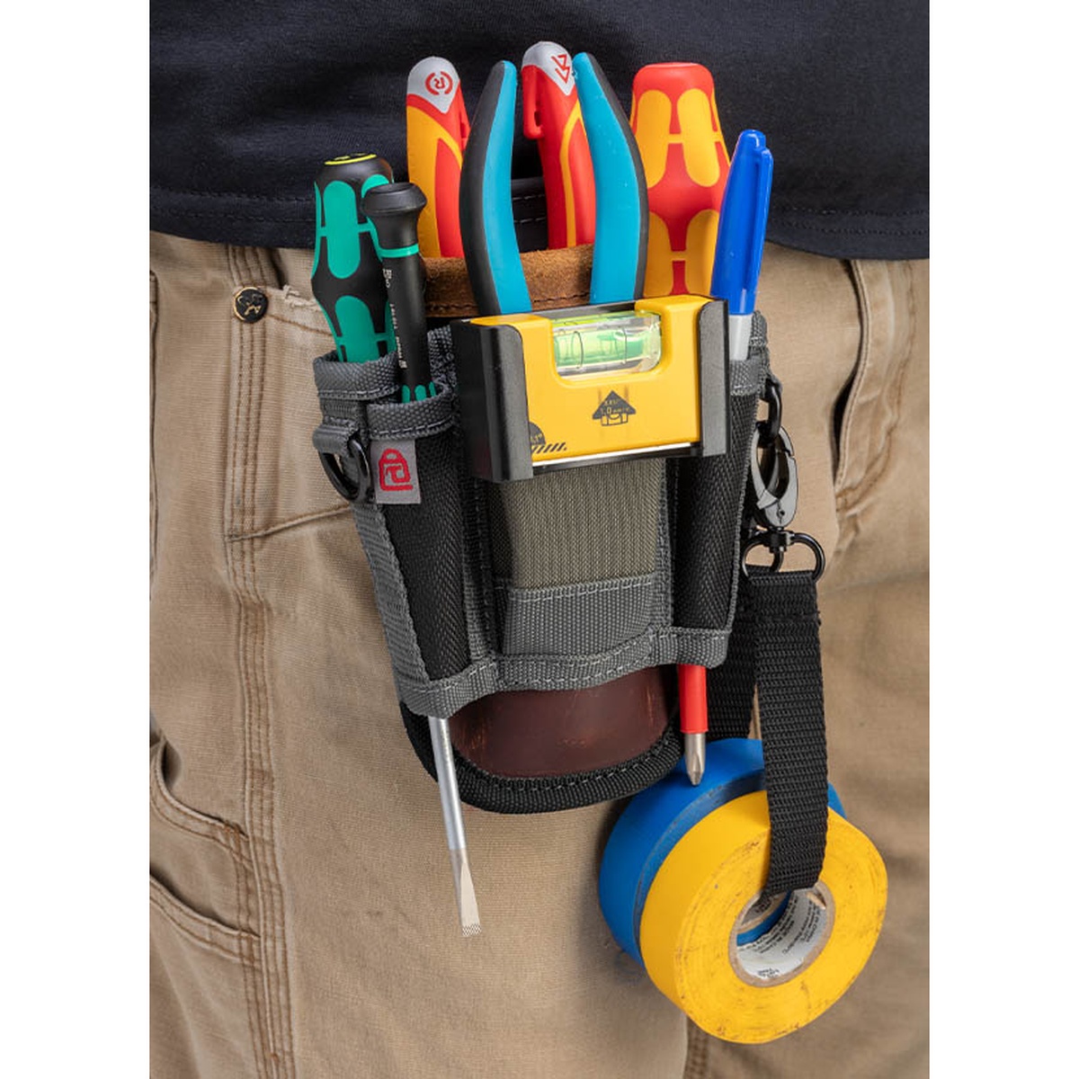 Veto Pro Pac VPP10859 SC45 Multi-Functional Tool Pouch worn on a belt carrying pliers, screwdrivers, a level, marker, and electrical tape during service work