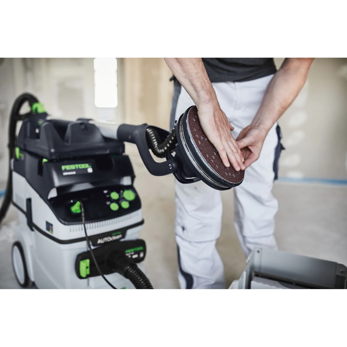 Festool 205650 Saphir Abrasive Sheets aligned on a PLANEX sanding pad with dust extraction holes matched for drywall sanding