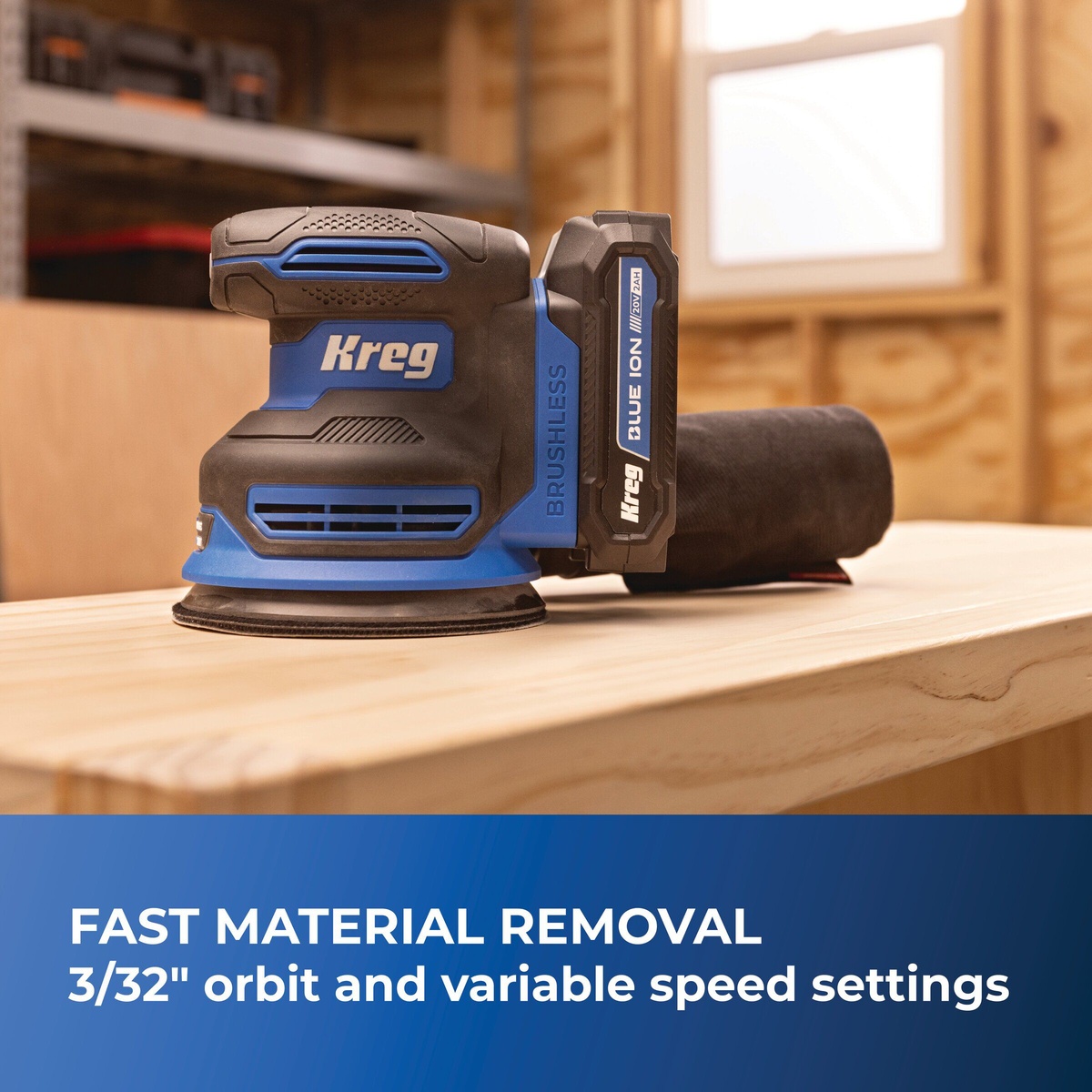 Kreg Tool KPTRS500A Brushless Random Orbital Sander resting on a wood board in a shop, showing brushless design and sanding pad