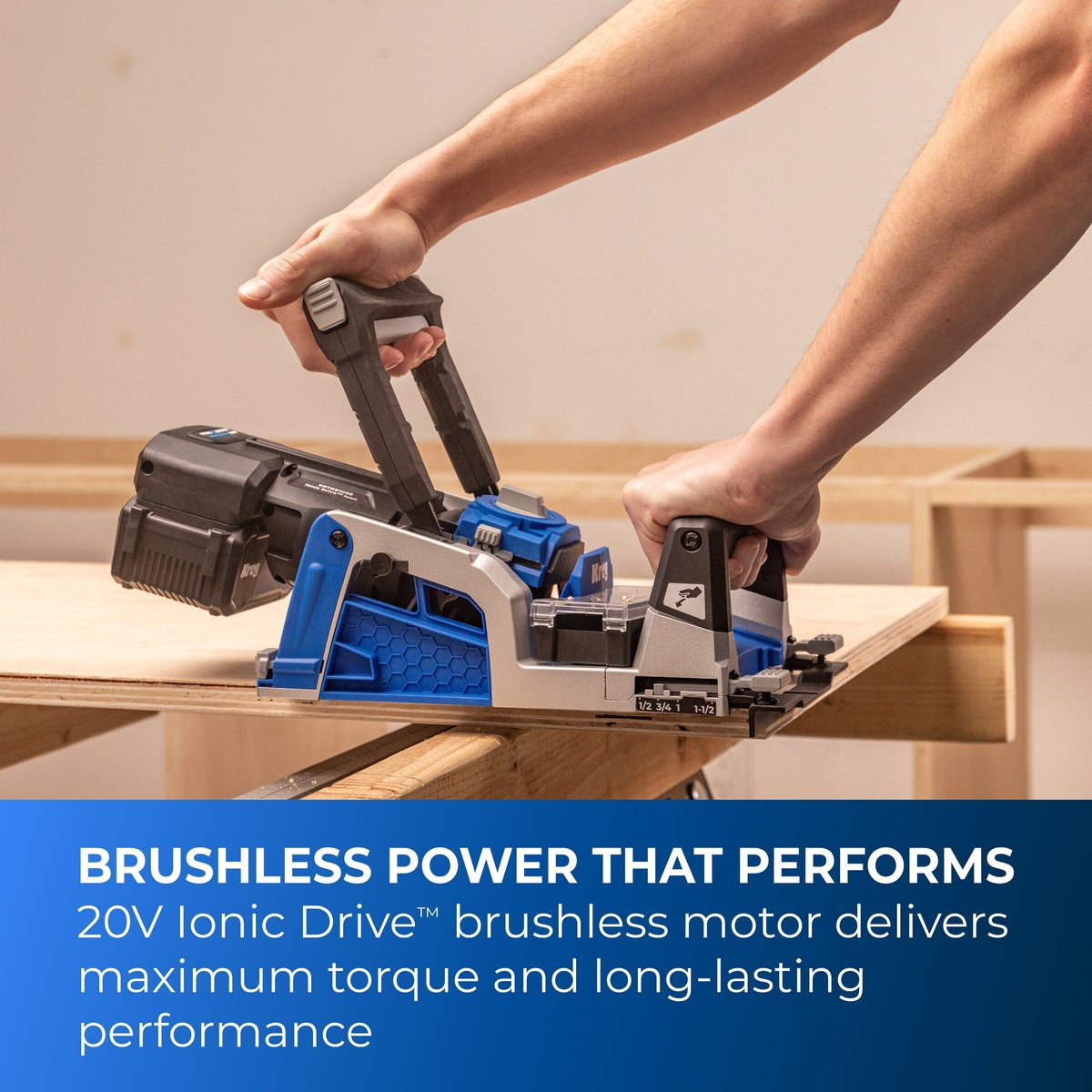 Kreg Tool KPTBRB100A pocket-hole jig drilling pocket holes into a plywood panel on a woodworking bench during cabinet and furniture assembly