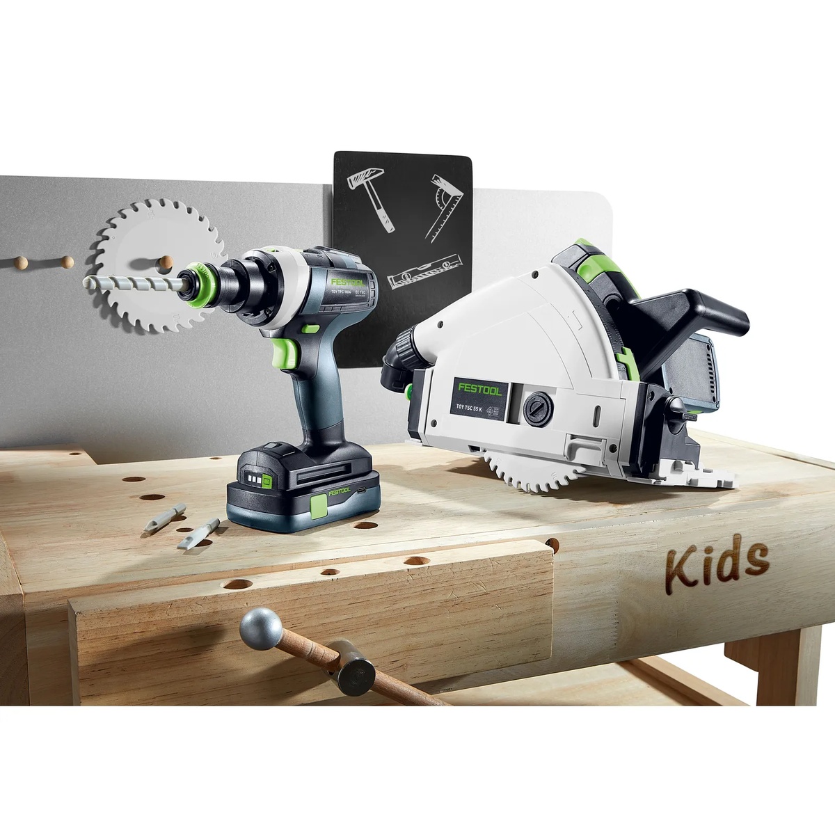 Festool TY-TPC Cordless Drill Toy with Battery displayed on a kids workbench next to a matching toy saw, showing pretend workshop play and Festool toy system context