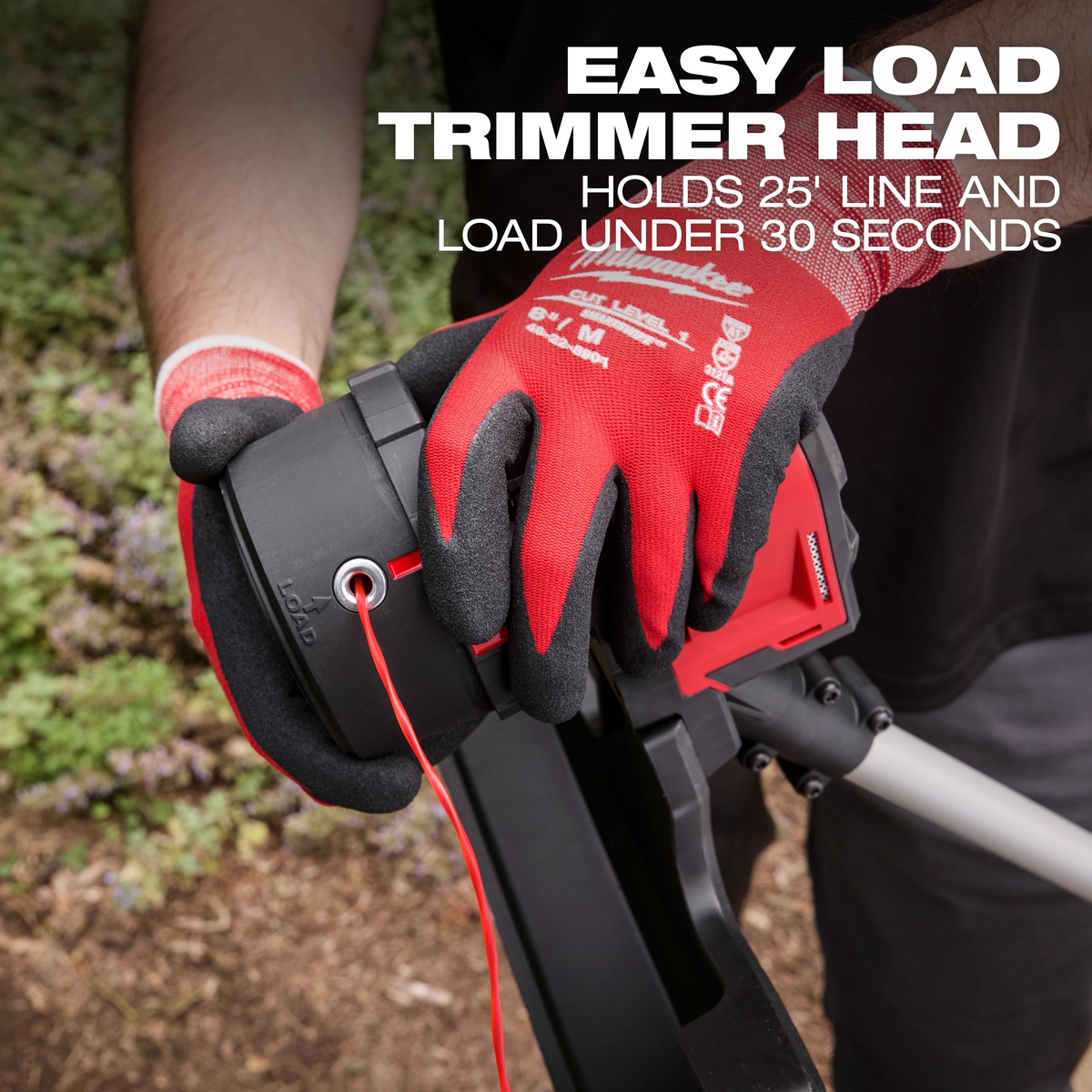 Milwaukee 2828-20E M18 Brushless String Trimmer easy load head being restrung by hand during outdoor trimming work