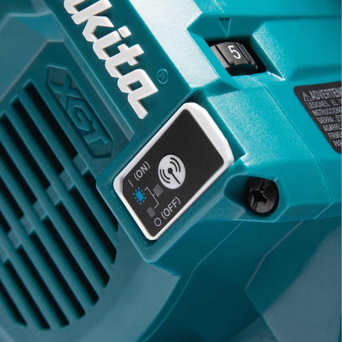 Makita plunge track saw AWS control button for Bluetooth dust extractor pairing during indoor cutting and finish jobsite work