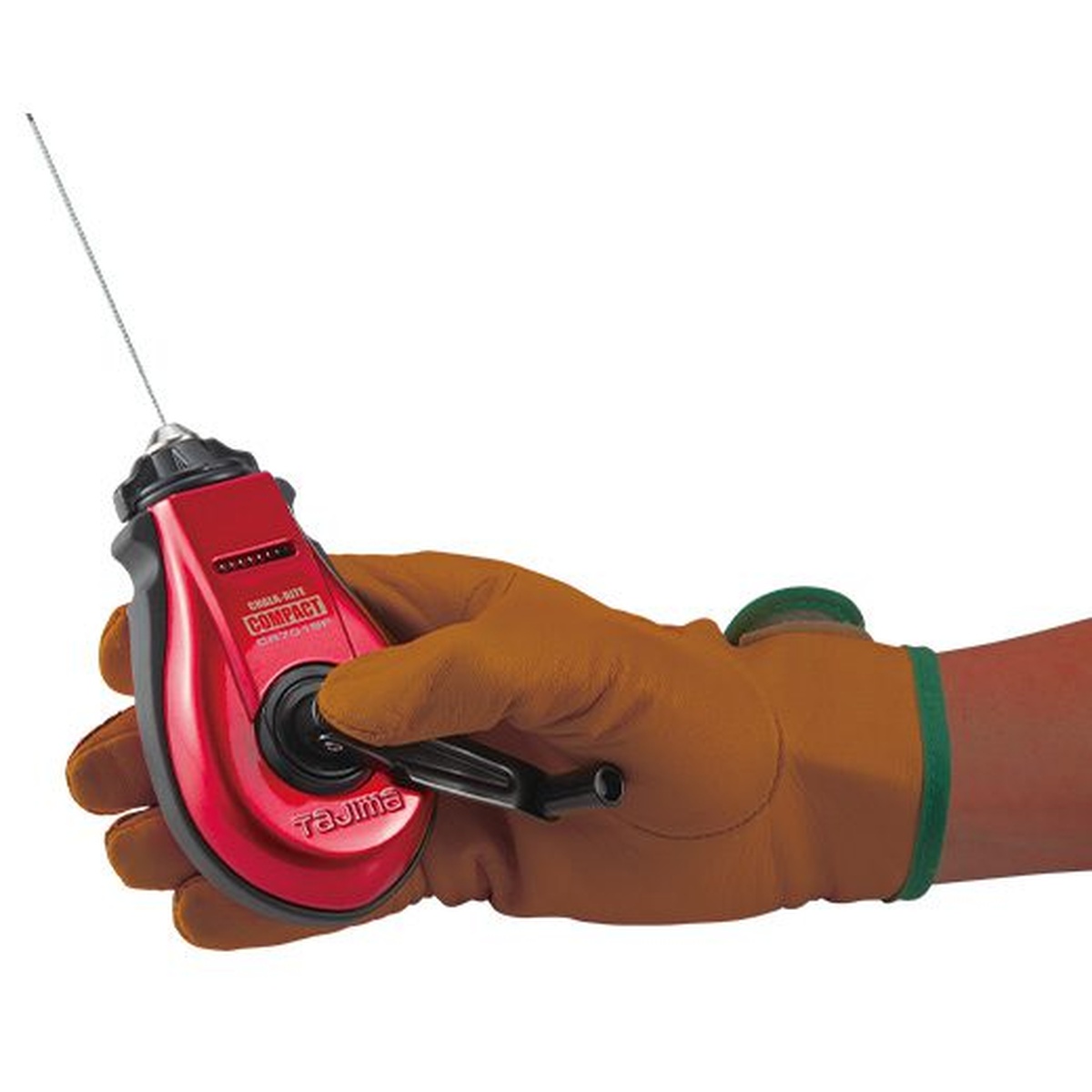 Tajima CR701SFR Chalk-Rite COMPACT Chalk Line held in a gloved hand while pulling line for layout marking